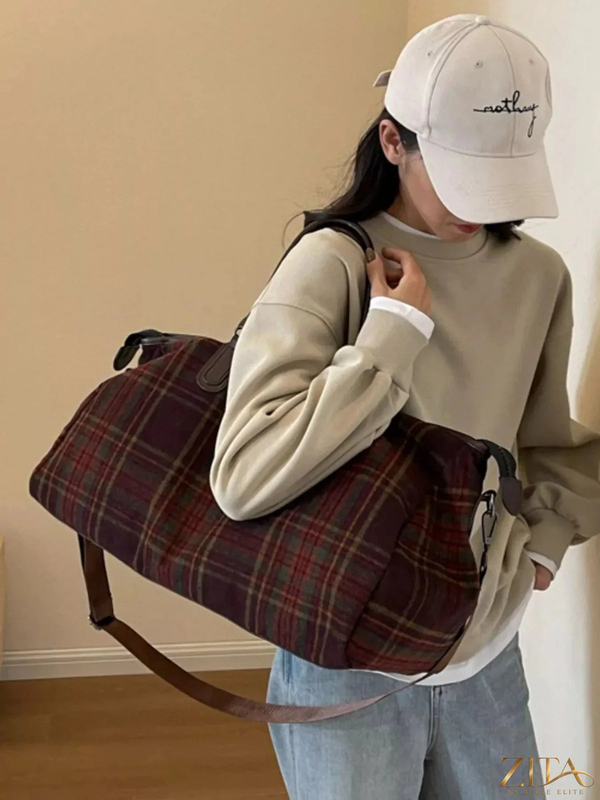 Vintage plaid pattern travel bag by Zita La Belle Elite, featuring sturdy handles and spacious interior for travel essentials.