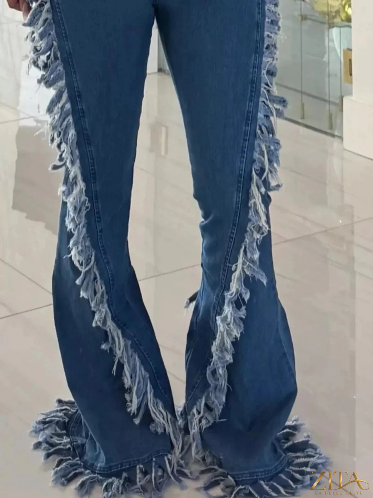 Zita La Belle Elite frayed trim high waist flare jeans with distressed detailing on a model, showcasing fashionable denim style.