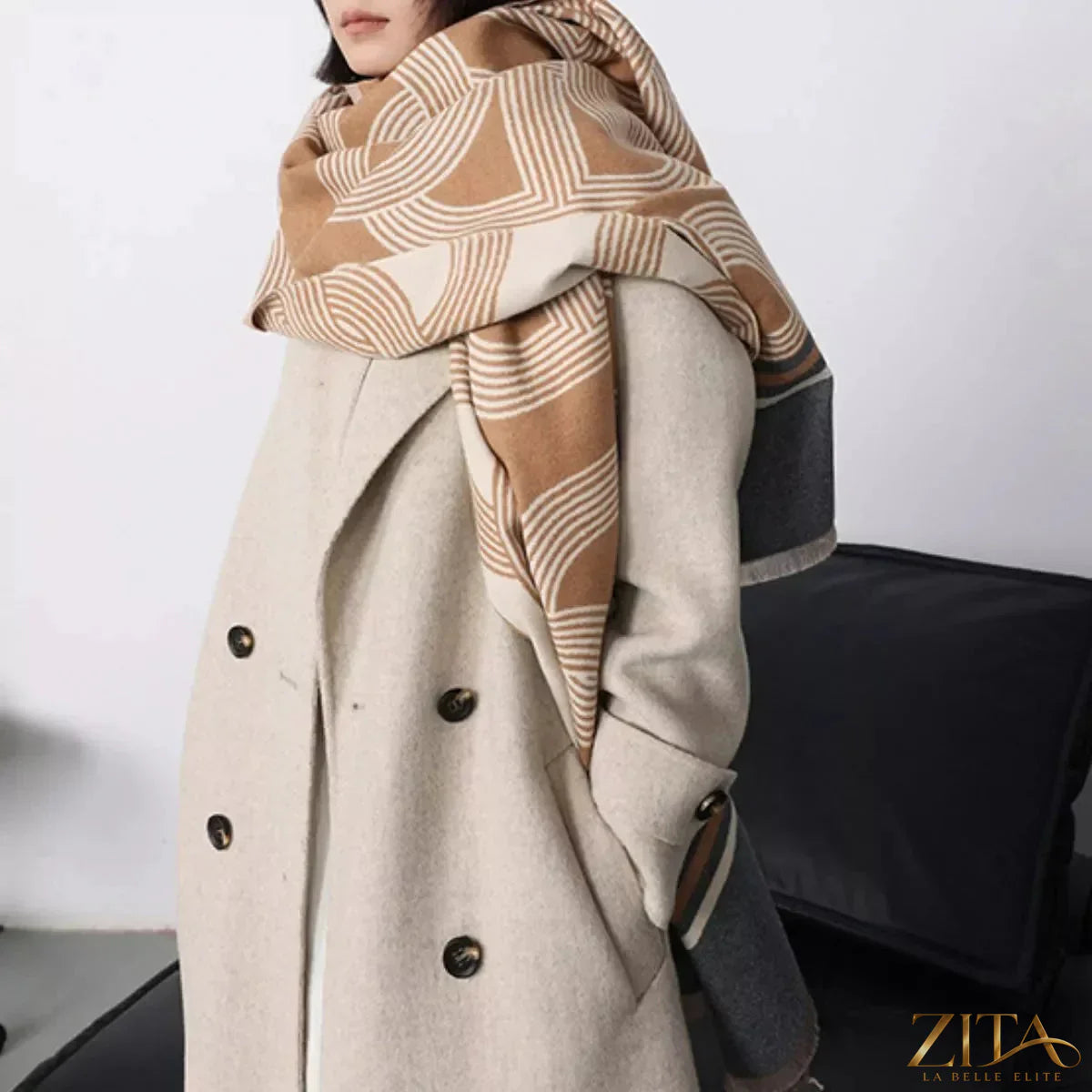 Zita La Belle Elite geometric pattern raw hem scarf with modern design and textured fabric, showcasing bold shapes and fringe edges.