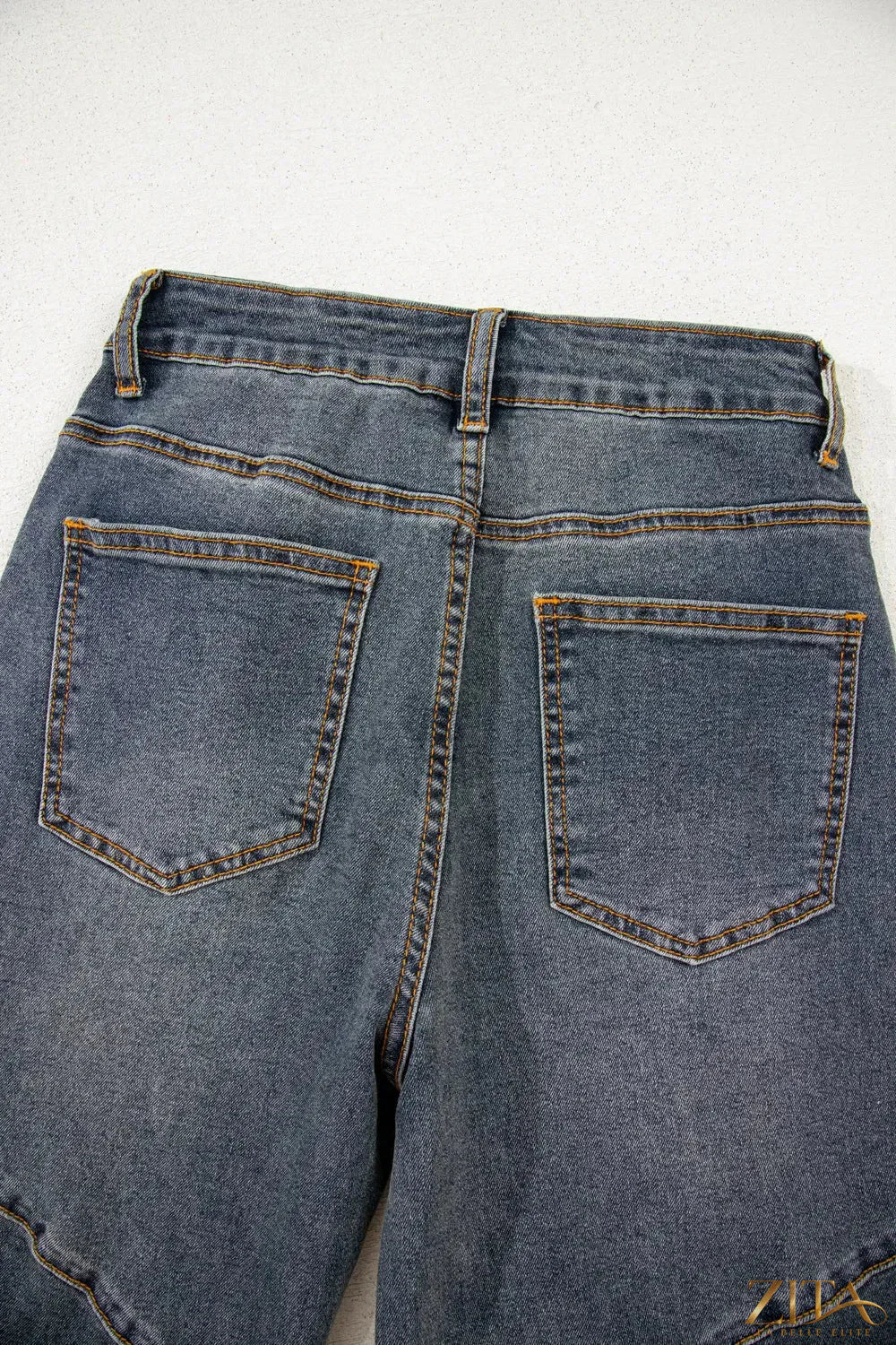 Zita La Belle Elite loose straight high waist jeans with exposed stitching and classic denim design, front view.