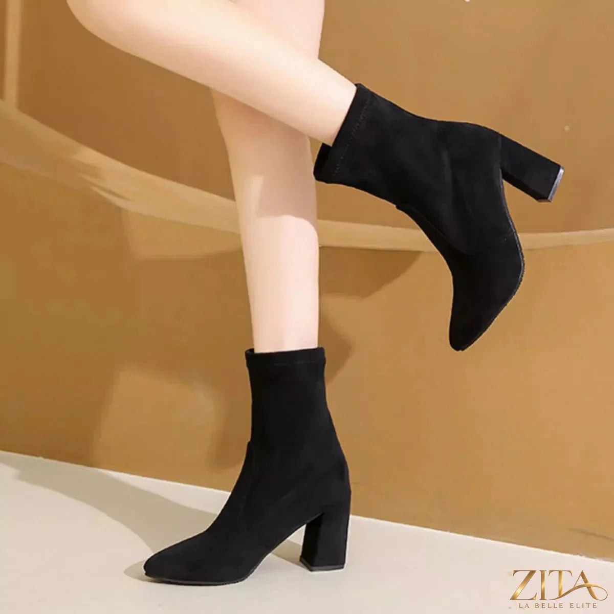 Zita La Belle Elite point toe block heel boots in black leather with sleek design and sturdy chunky heels.