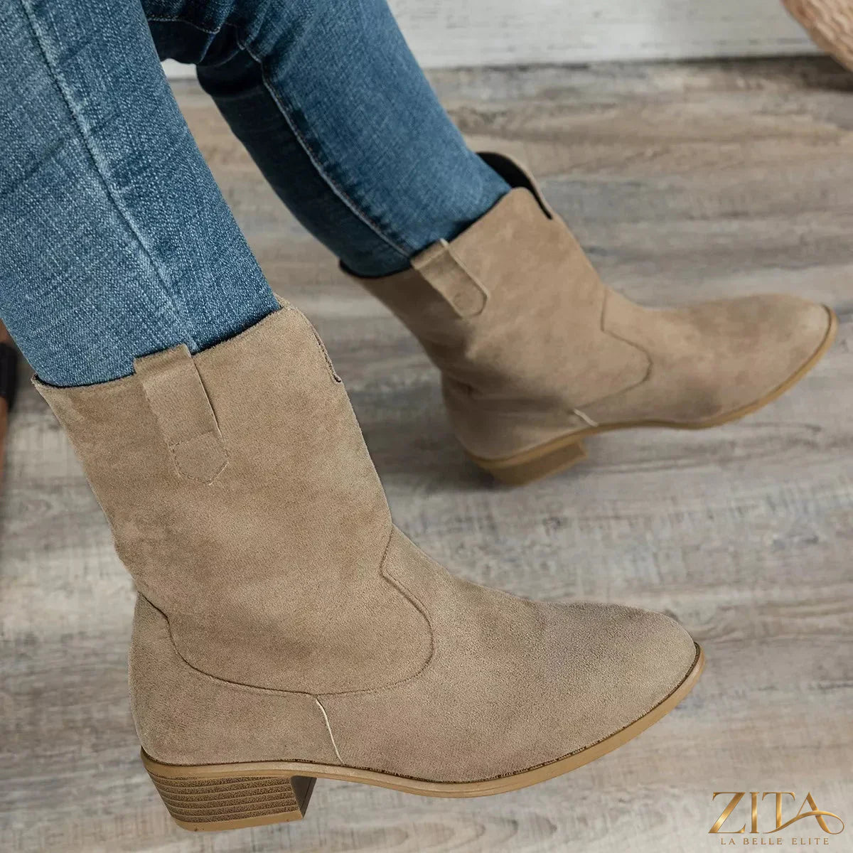 Trendsi suede block heel Western boots featuring pointed toes, classic stitching, and mid-height heels on brown leather soles.