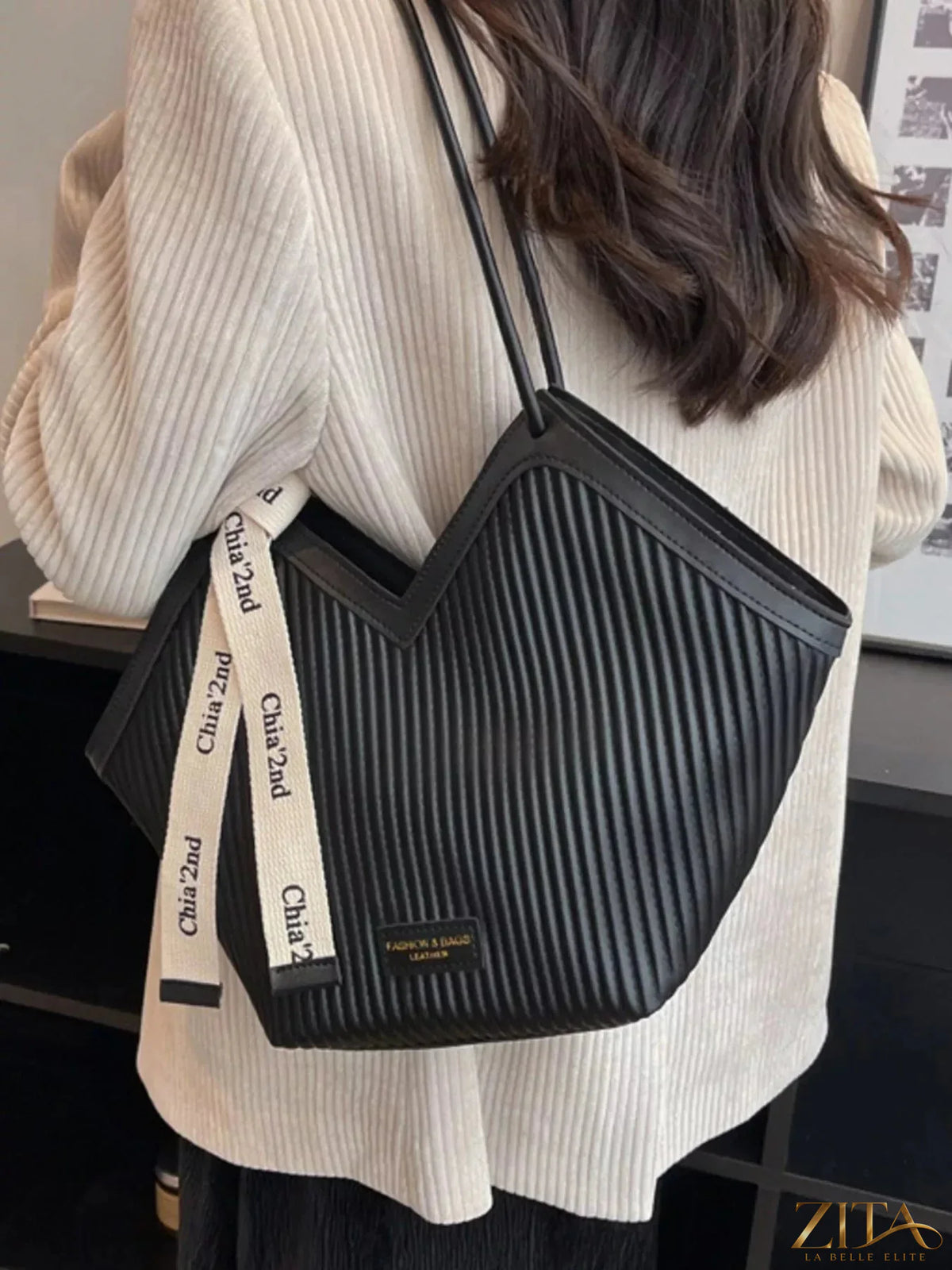 Zita La Belle Elite textured leather shoulder bag with stylish design and silver hardware, featuring a spacious interior and adjustable strap.