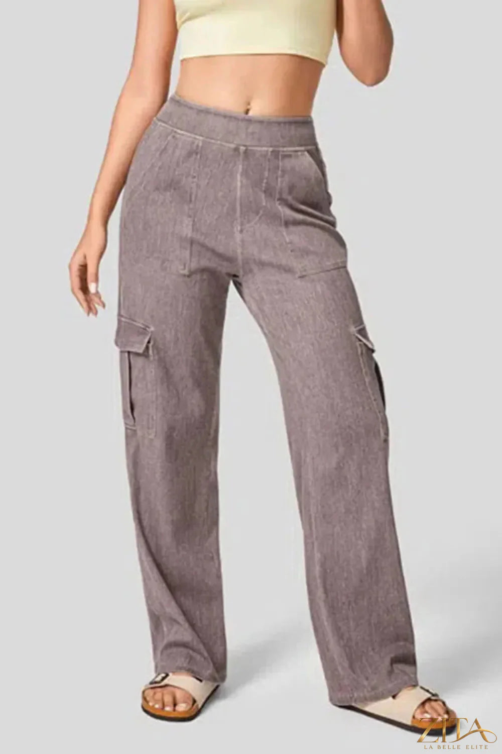 Zita La Belle Elite high waist straight leg cargo jeans with multiple pockets and classic denim wash, styled on a model.