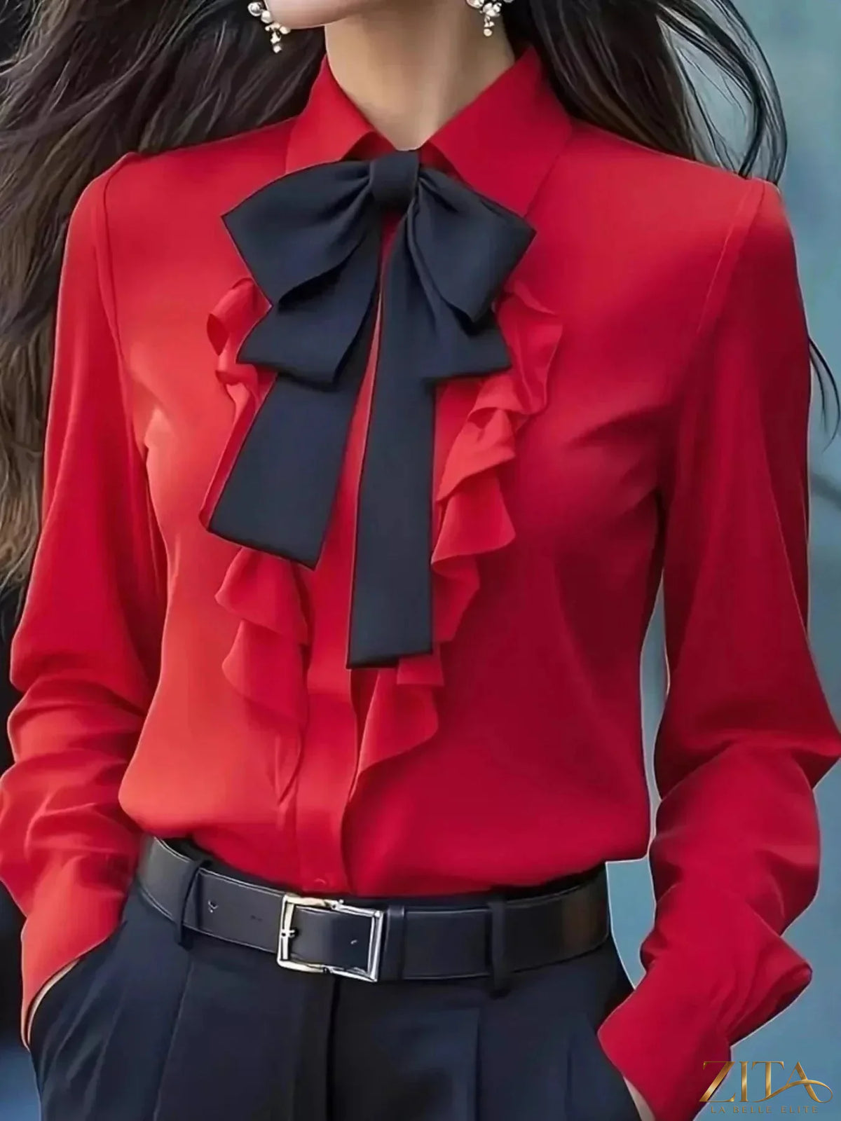 Zita La Belle Elite ruffled tie-front long sleeve blouse with feminine details and elegant design, shown on a hanger.