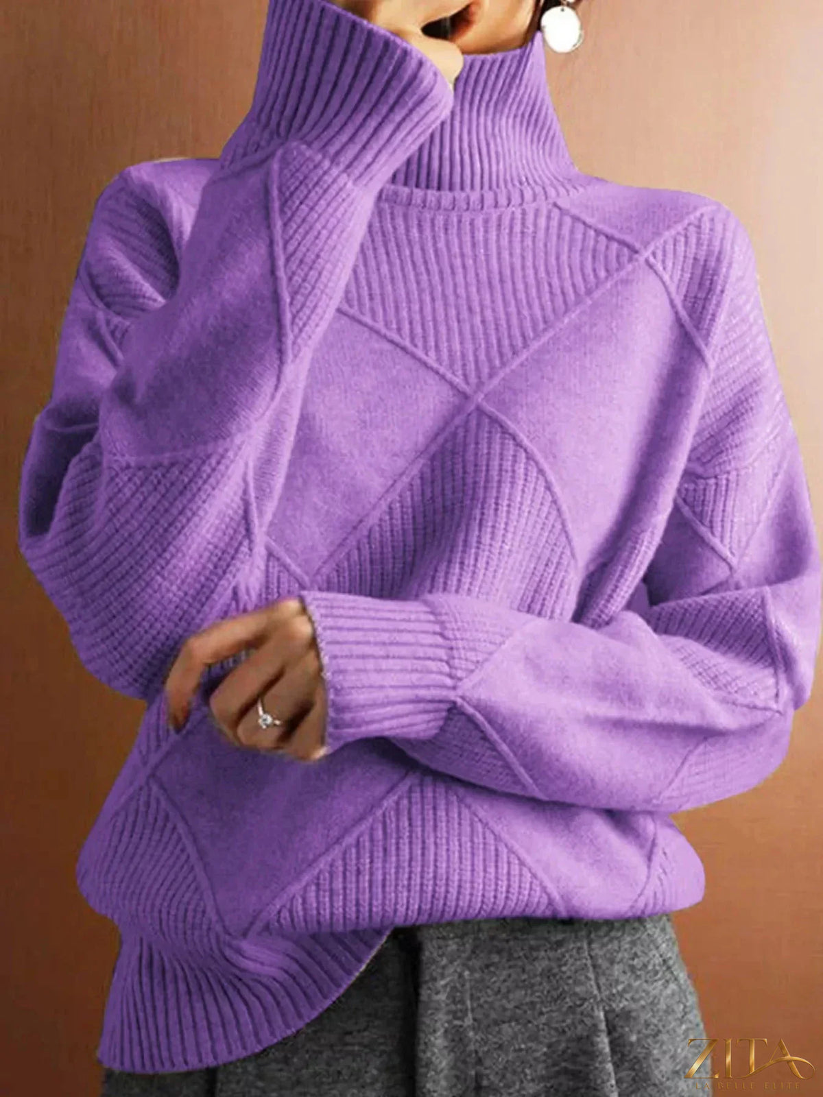 Zita La Belle Elite argyle pattern turtleneck sweater in navy and cream, showcasing the cozy knit design and classic style.