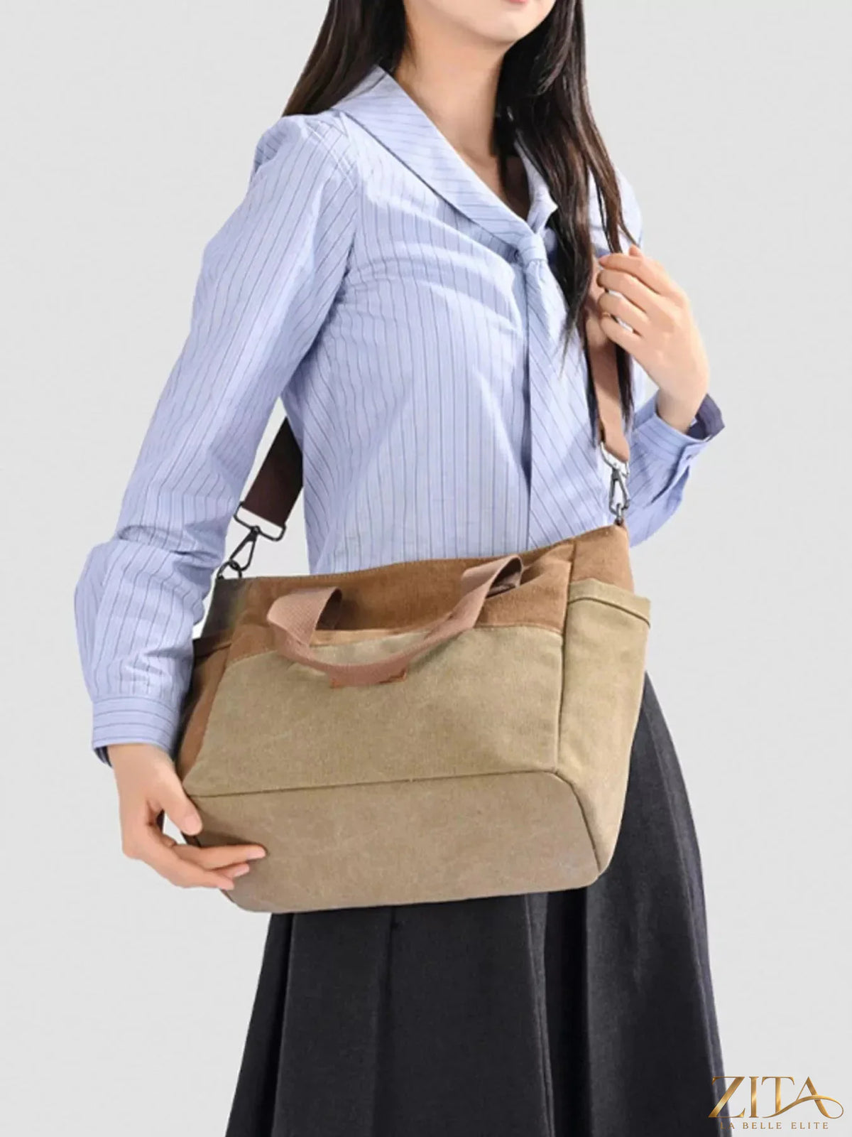 Zita La Belle Elite travel bag with multiple pockets, featuring durable fabric, multiple compartments, and a sleek design for organized packing.