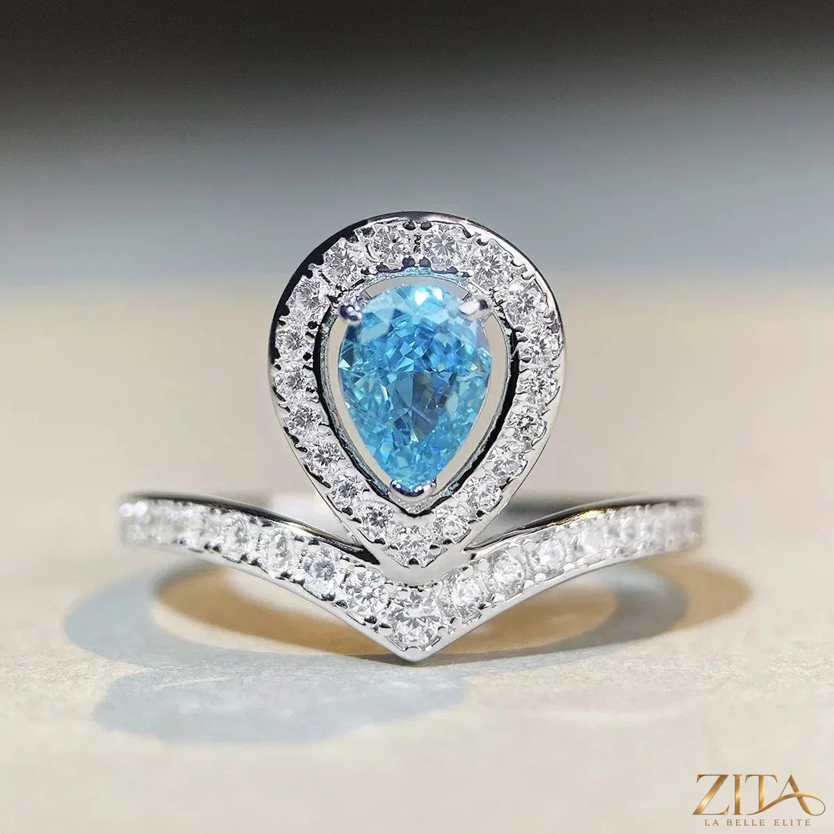 Sterling silver zircon teardrop ring featuring a teardrop-shaped zircon stone set in a sleek silver band.