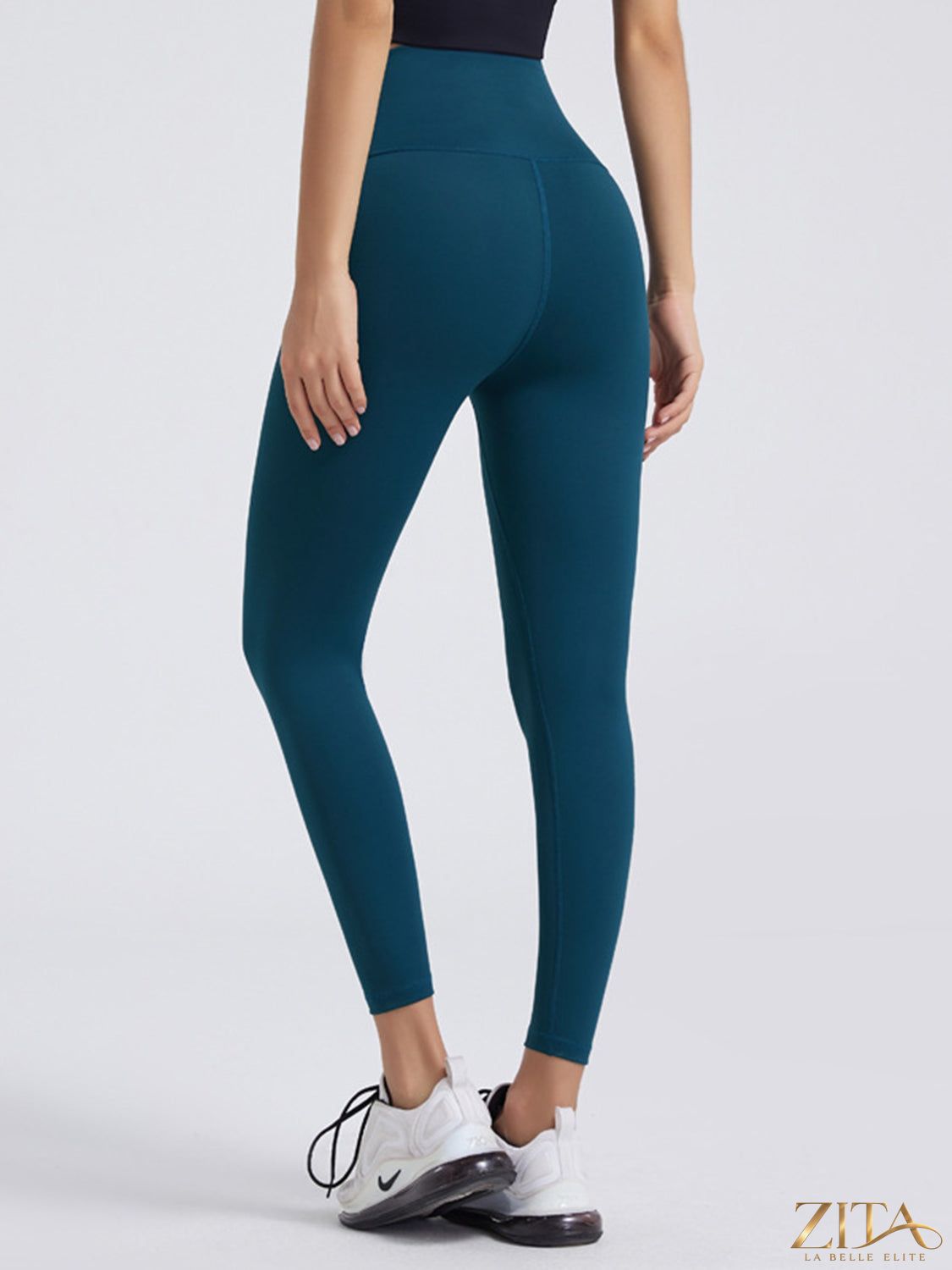 Zita La Belle Elite wide waistband sports leggings in black, showing a close-up of the stretchy, high-rise waistband and smooth fabric.
