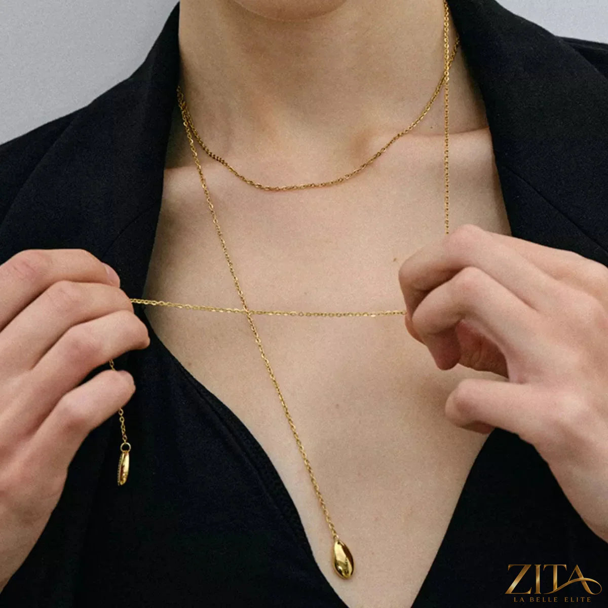 18K gold-plated Y-shaped necklace by Zita La Belle Elite featuring delicate chain and elegant pendant.