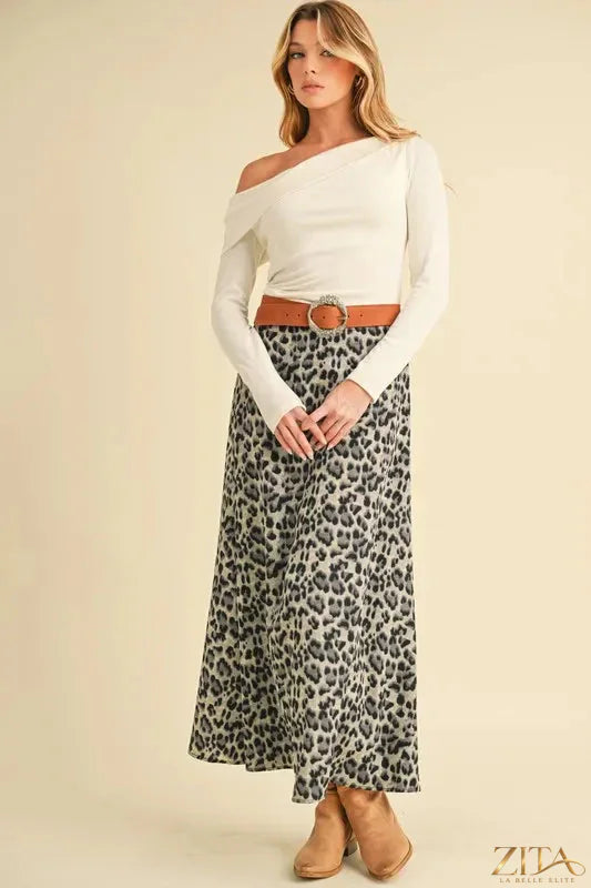 Aemi+Co leopard print midi skirt by Trendsi featuring a flowy silhouette and stylish animal print fabric.