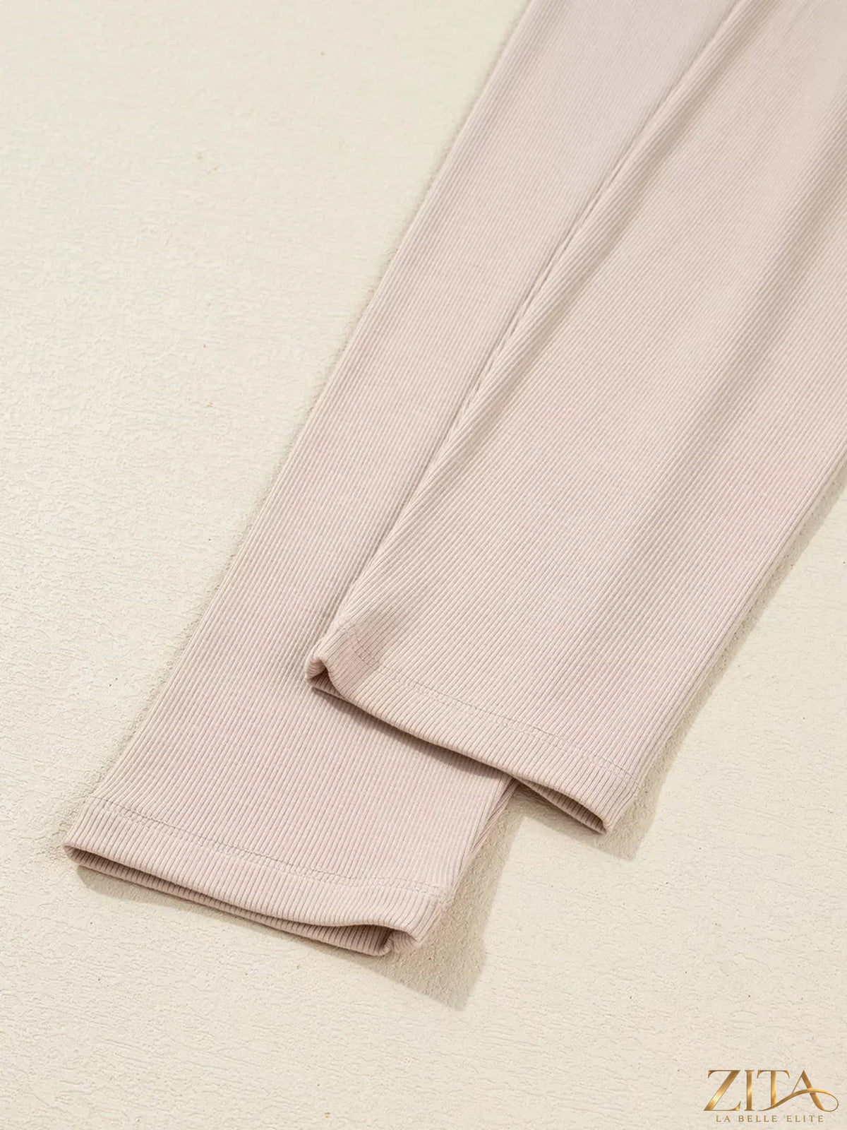 Zita La Belle Elite solid color oversize slit sweatshirt and ribbed matching leggings 2-piece set on a model.