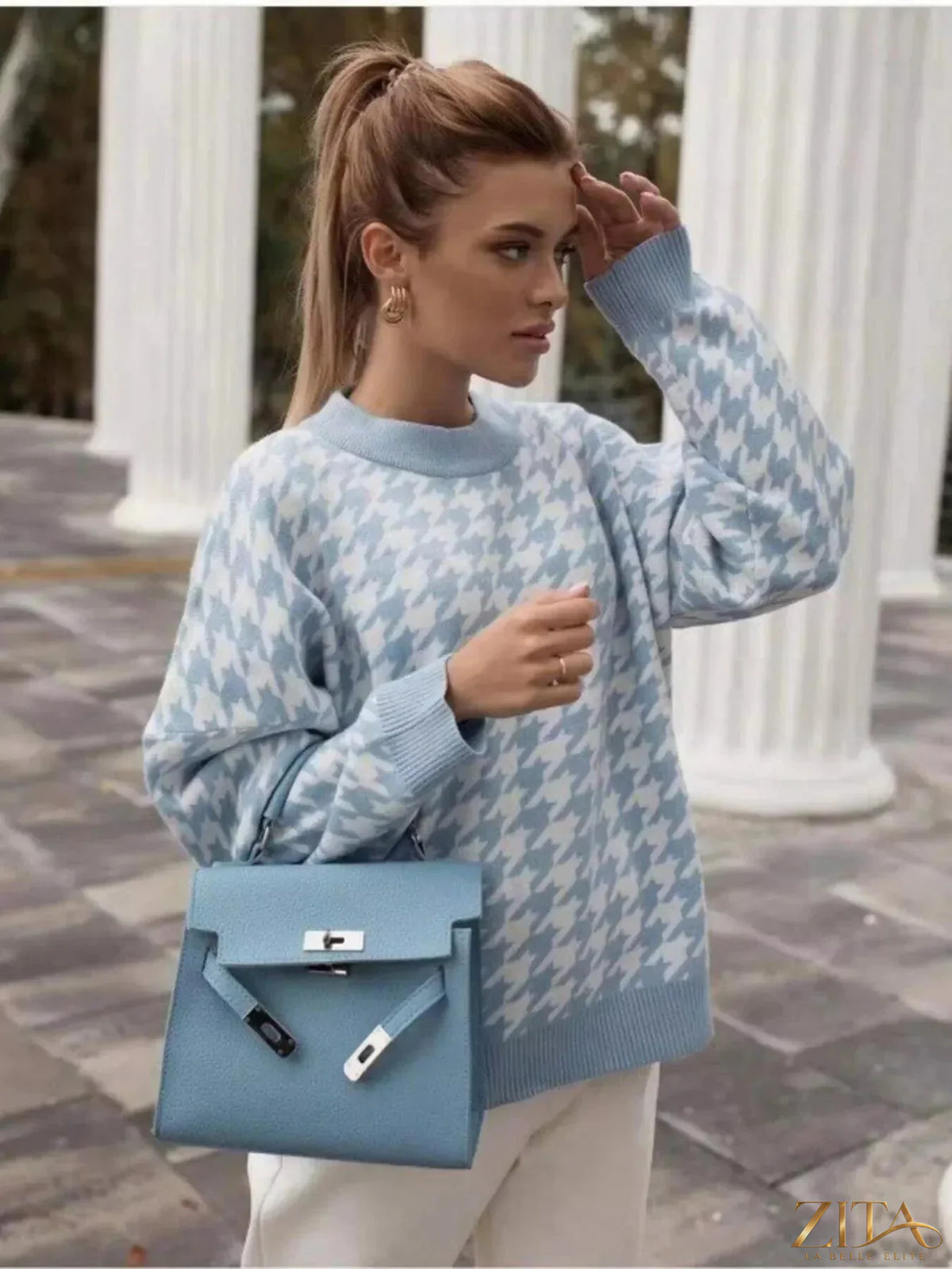 Zita La Belle Elite oversized sweater with classic black and white houndstooth pattern, cozy knit fabric, and relaxed fit.