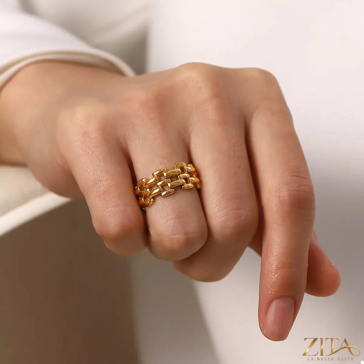 18K gold-plated cutout ring by Zita La Belle Elite featuring intricate openwork design on a sleek band.