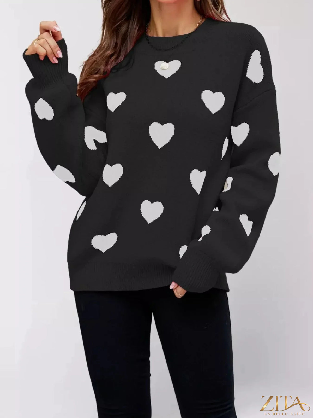 Heart-patterned dropped shoulder sweater by Zita La Belle Elite, featuring cozy knit fabric and relaxed fit with romantic heart designs.