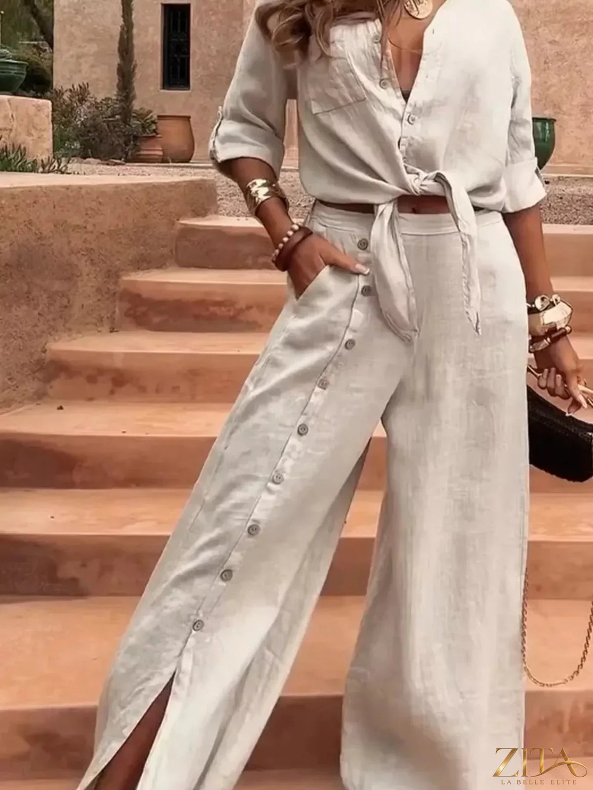 Plus size Zita La Belle Elite tie-front shirt and wide-leg button-down pants set, shown on a model.