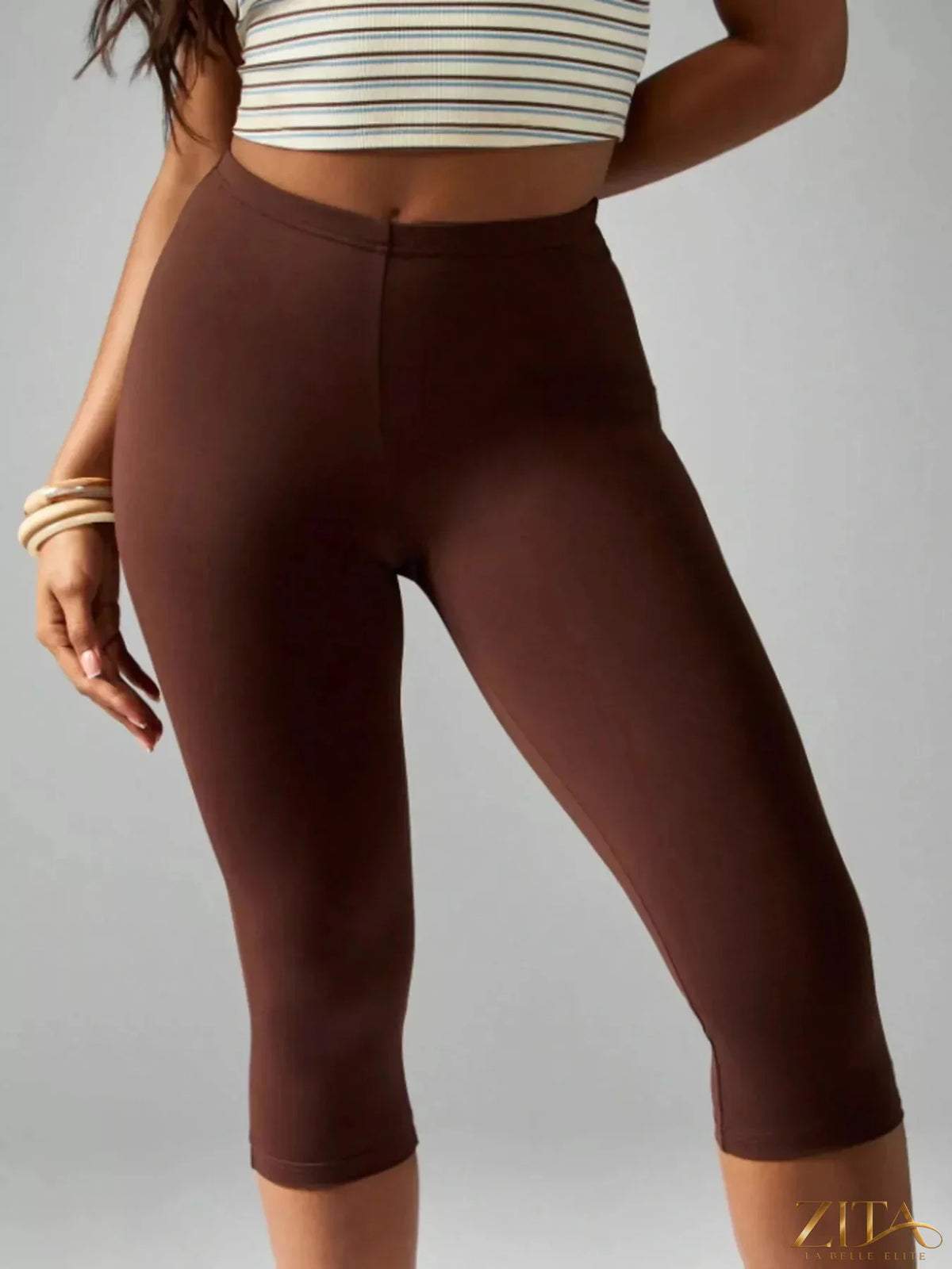 Zita La Belle Elite high-waisted active capri leggings with a fitted design, shown in black on a plain background.