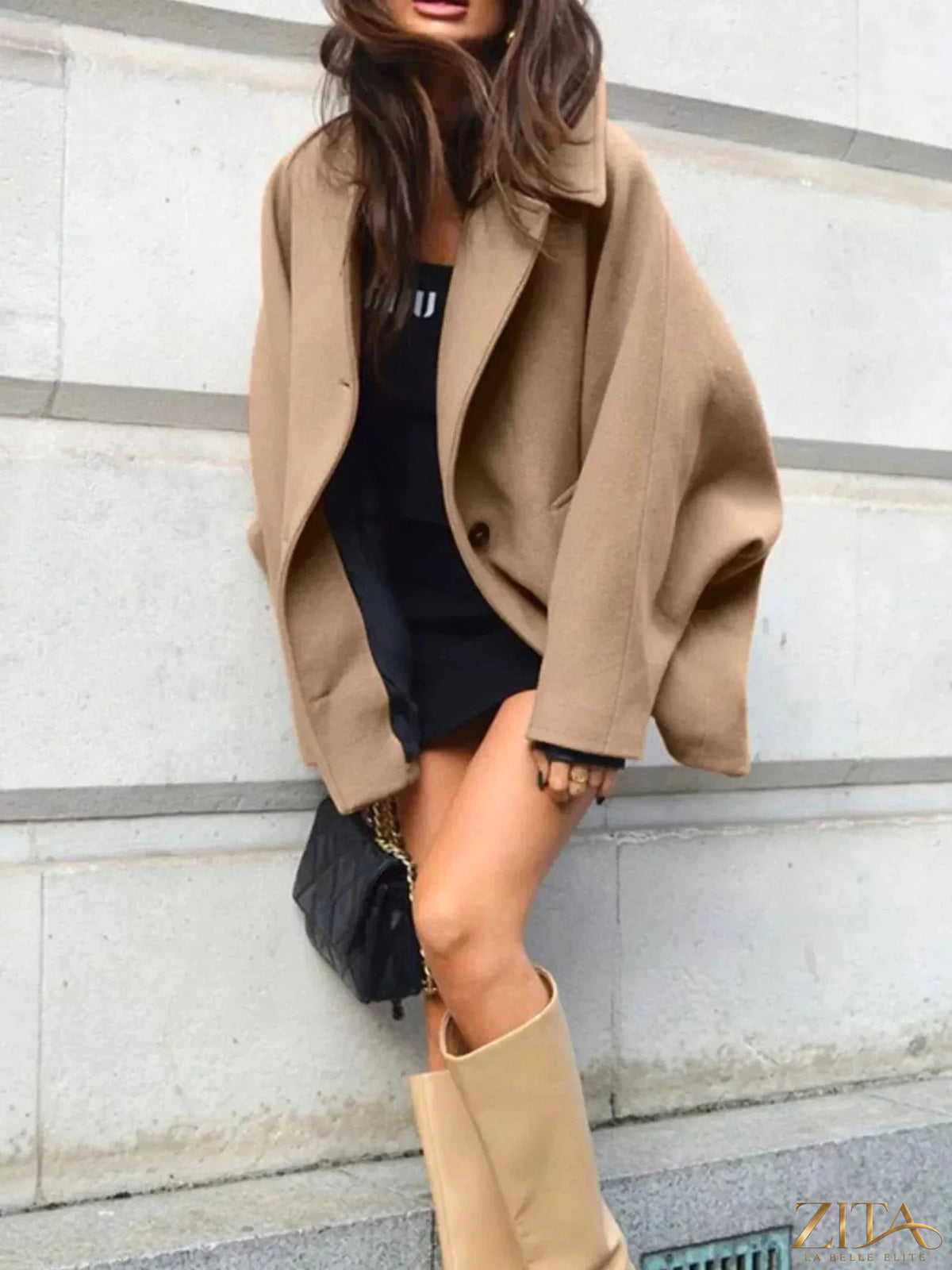 Zita La Belle Elite oversized button-down coat with a lapel collar, featuring a stylish, relaxed fit and neutral fabric.