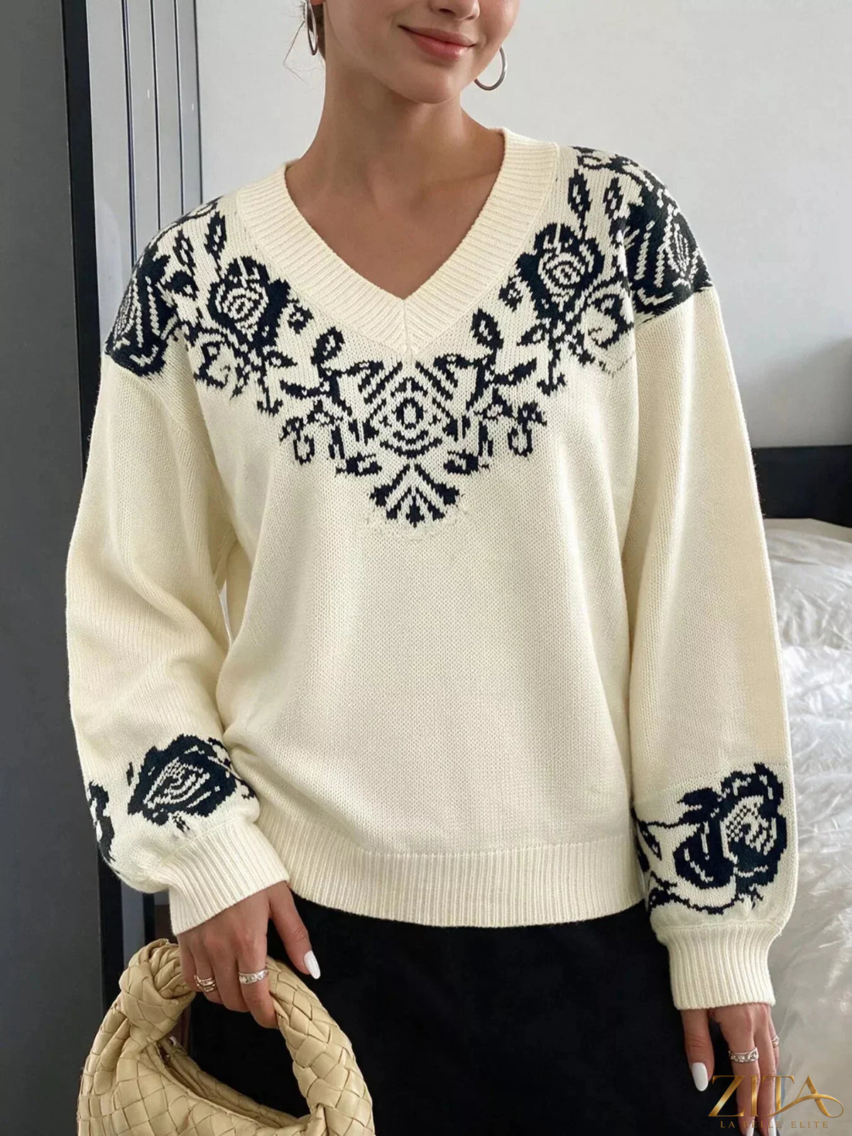 Zita La Belle Elite floral dropped shoulder sweater featuring colorful floral patterns and a relaxed fit.