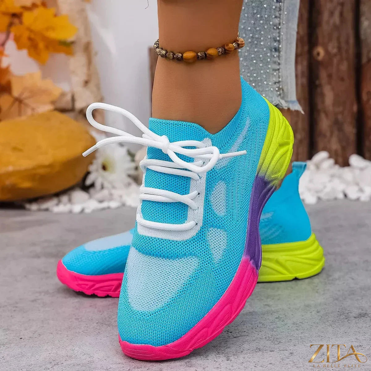 Zita La Belle Elite lace-up round toe sneakers in stylish design, featuring white laces and a comfortable rubber sole.