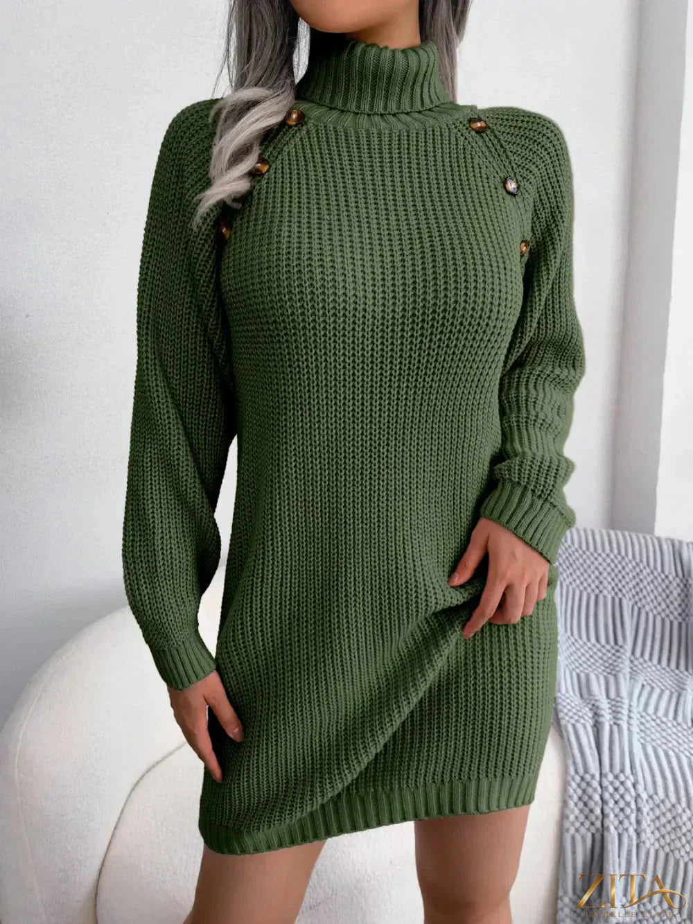 Decorative button turtleneck sweater dress in a cozy knit fabric, featuring a high collar and stylish button details.