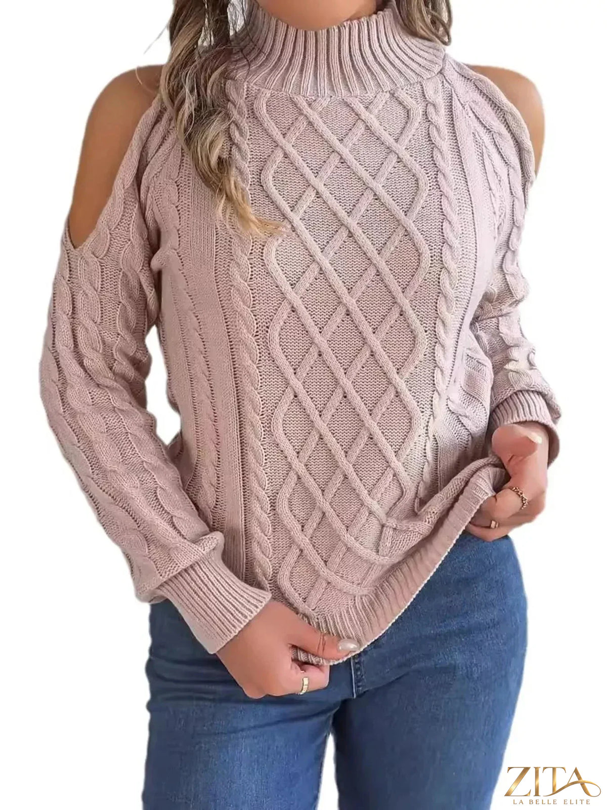 Zita La Belle Elite cold-shoulder cable knit sweater featuring a cozy design with open shoulder cutouts and textured knit pattern.
