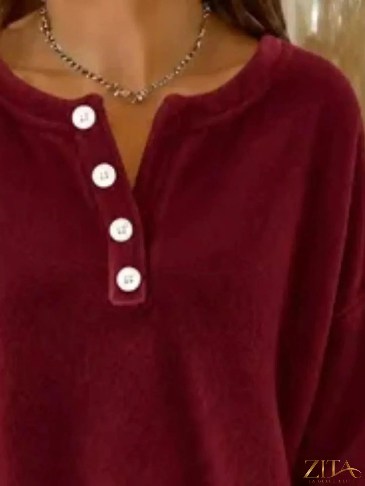 Zita La Belle Elite Button Detail Dropped Shoulder Sweatshirt in soft fabric with decorative buttons and relaxed fit.