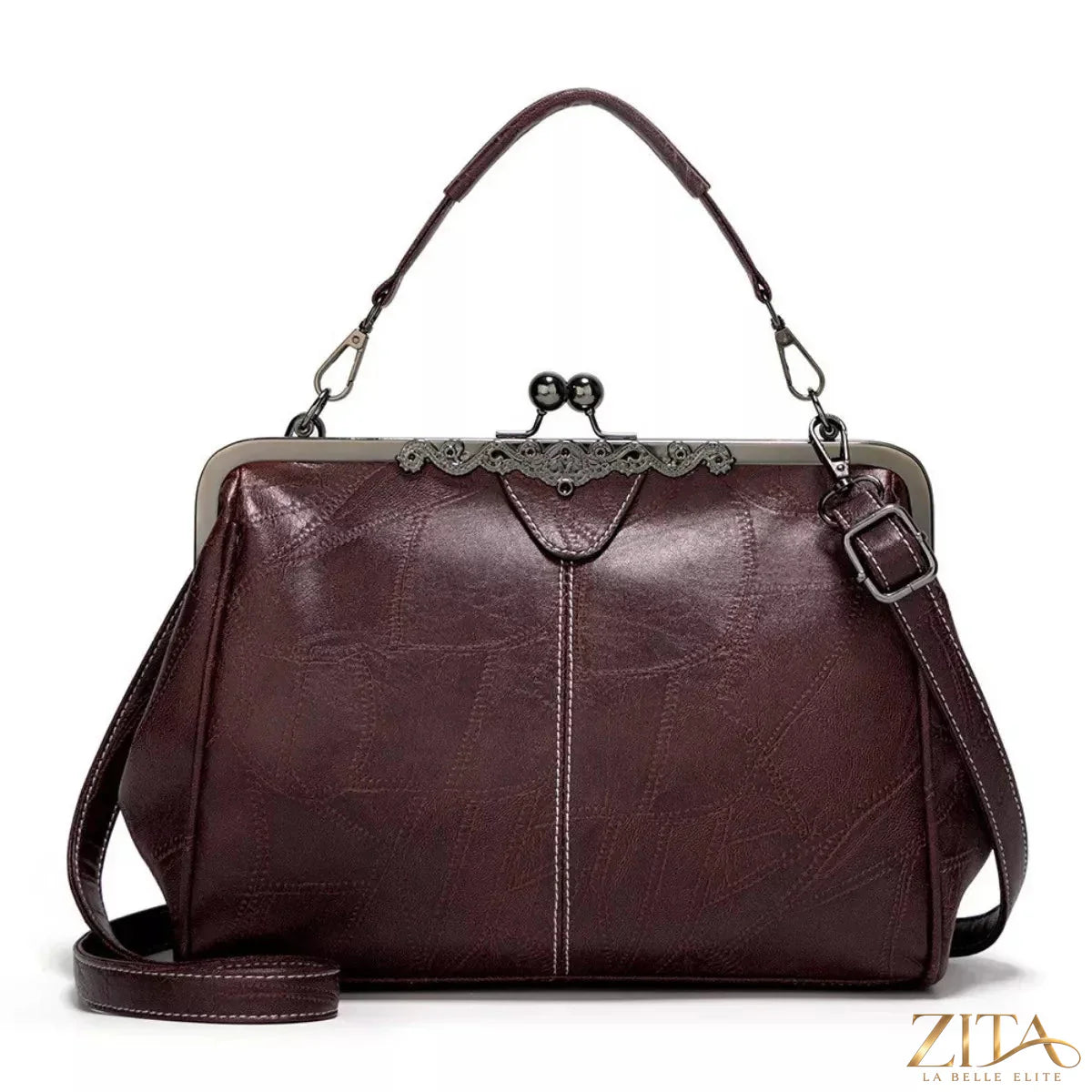 Vintage Kiss Lock leather handbag by Zita La Belle Elite with classic design and metal clasp closure, shown in a close-up view.