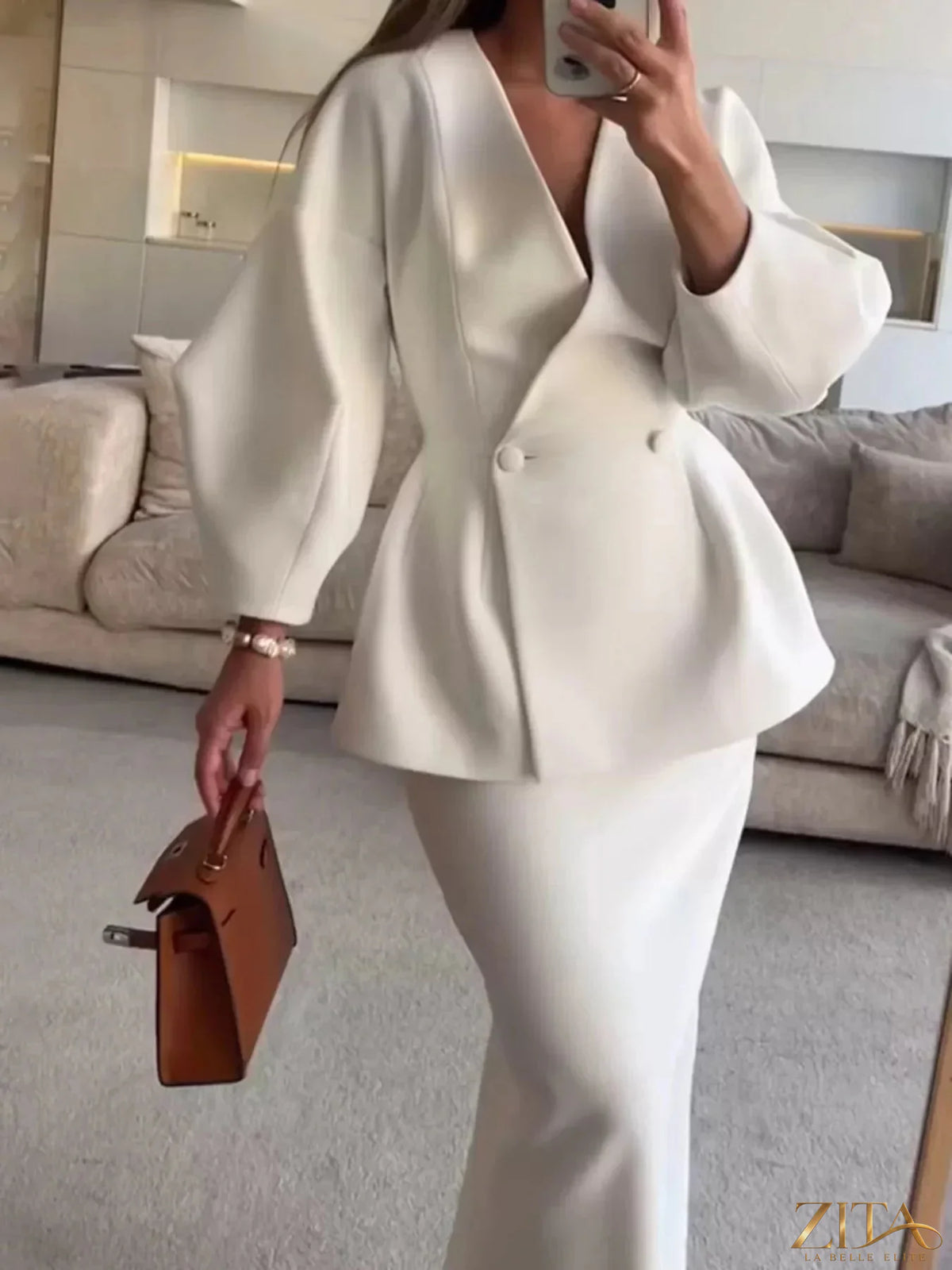 Zita La Belle Elite double-breasted peplum blazer and matching skirt set, stylish formal outfit on a model.