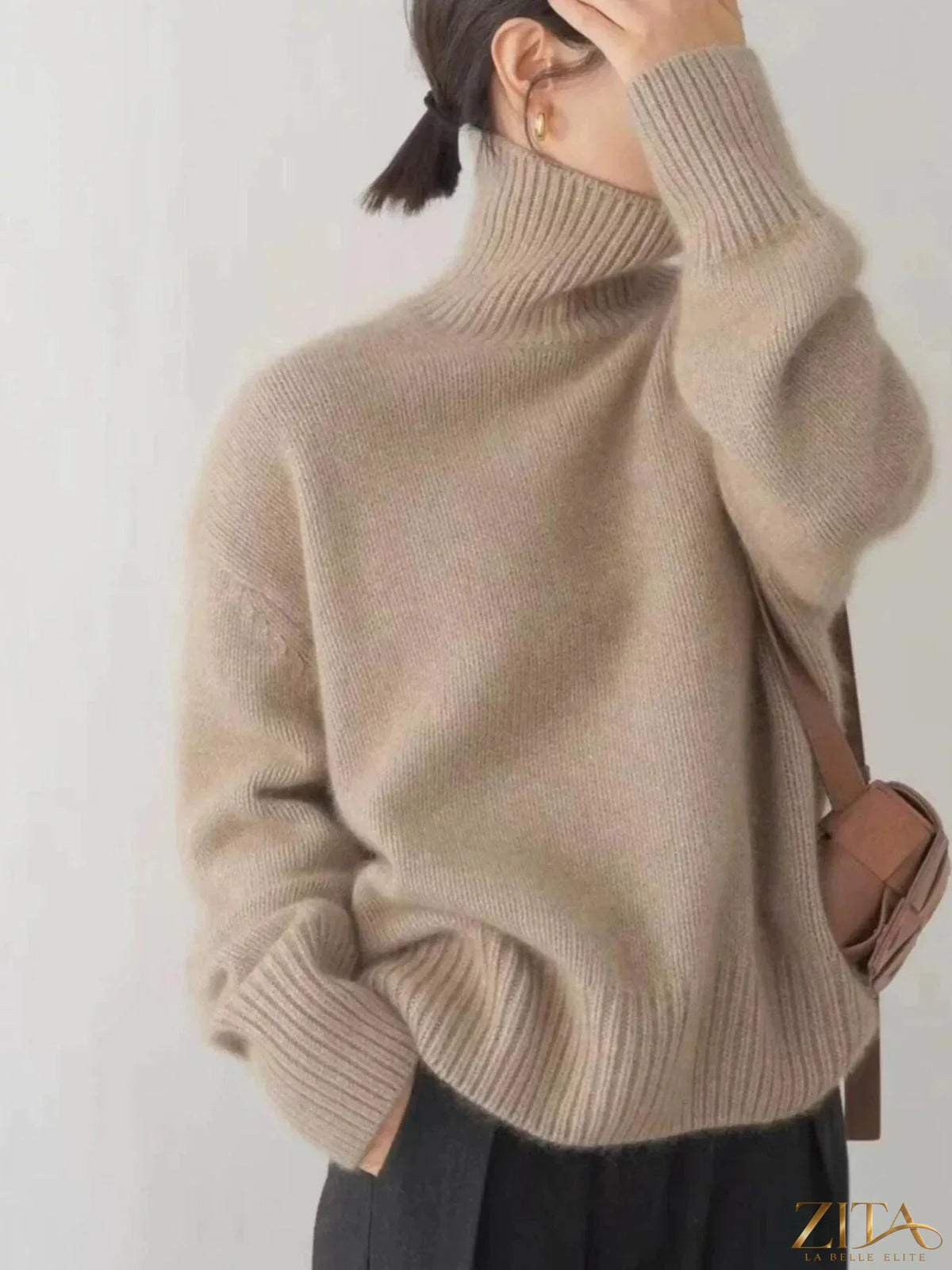 Zita La Belle Elite turtleneck dropped shoulder sweater in cozy knit fabric, featuring a relaxed fit and stylish silhouette.