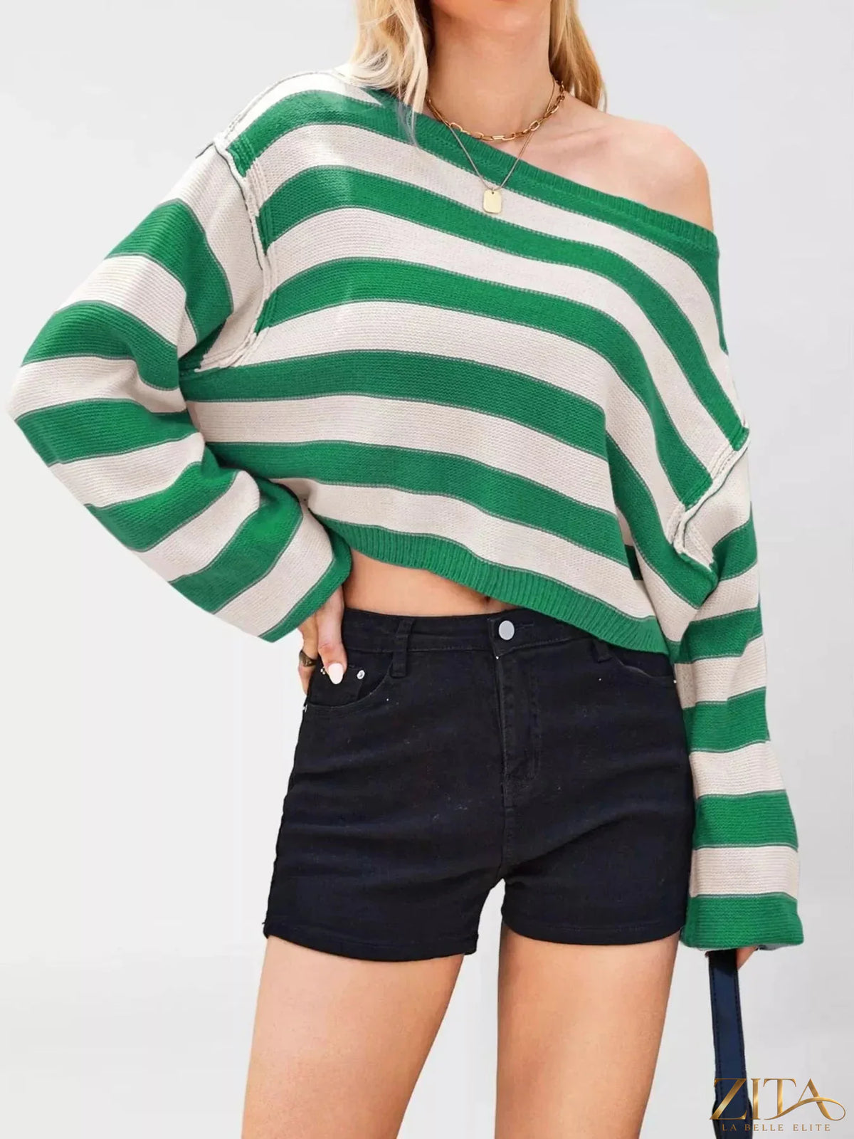 Striped boat neck sweater from Trendsi featuring horizontal navy and white stripes, soft knit fabric, and a relaxed fit.