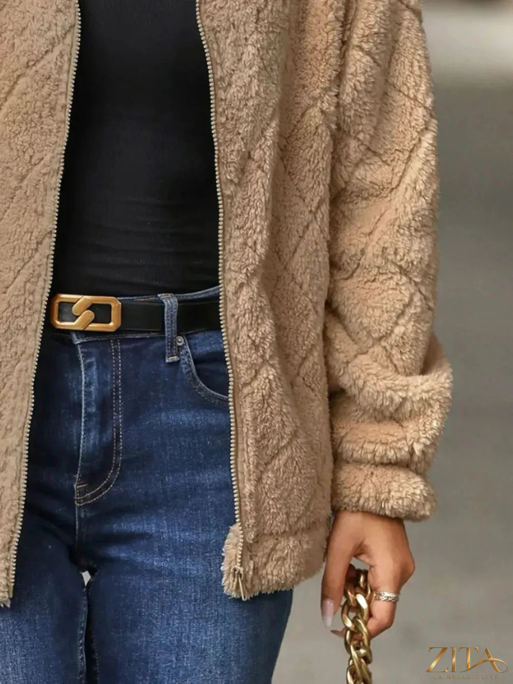 Zita La Belle Elite fuzzy pocketed zip-up jacket with front pockets and a cozy, textured fleece exterior.