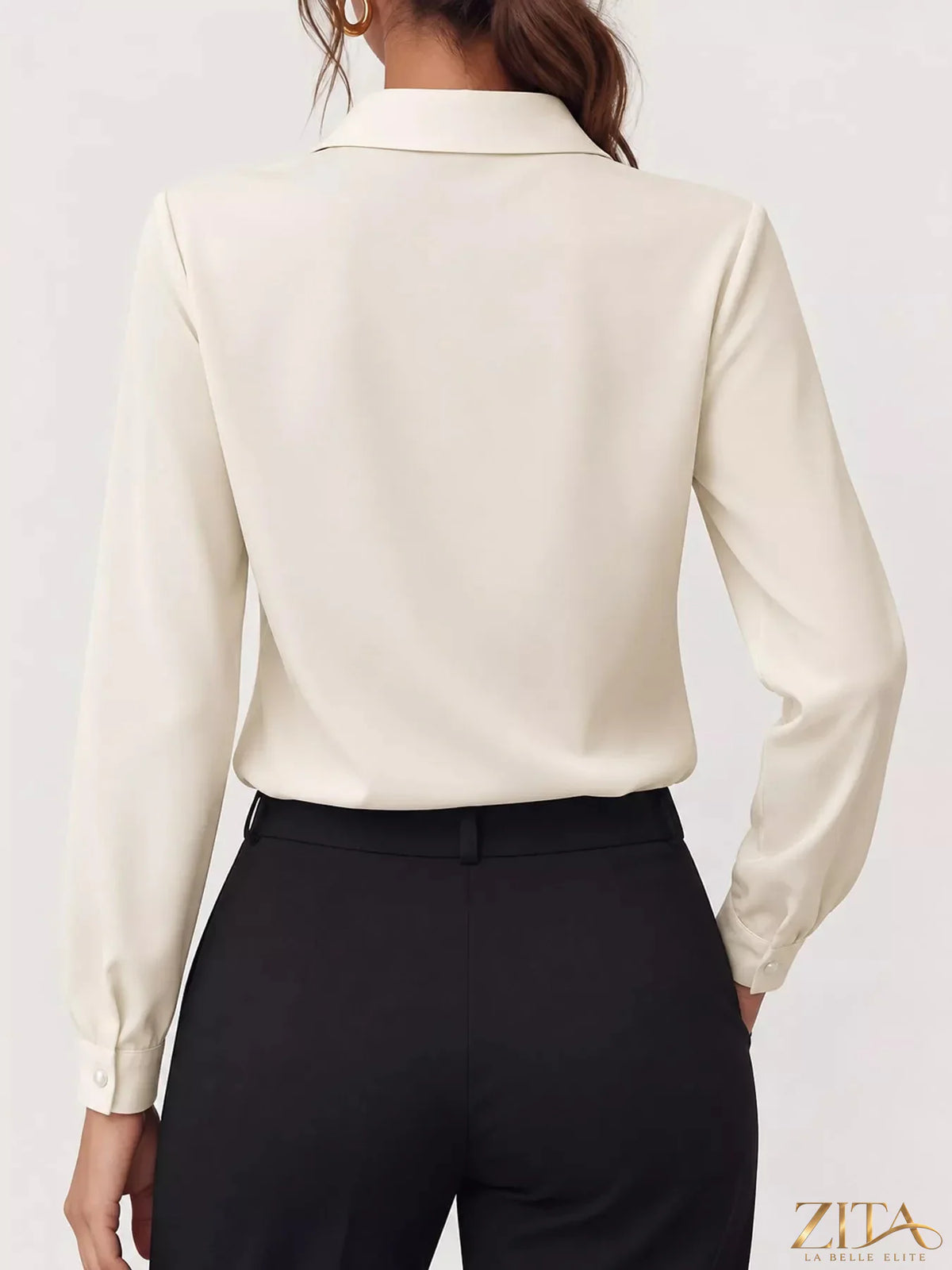 Zita La Belle Elite long sleeve satin blouse in soft sheen fabric, shown on a hanger with a fitted collar and button front.
