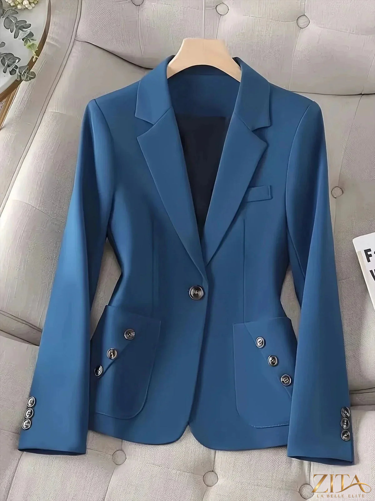 Trendsi one-button blazer with front pockets, tailored fit, in a neutral color, styled for a polished professional look.