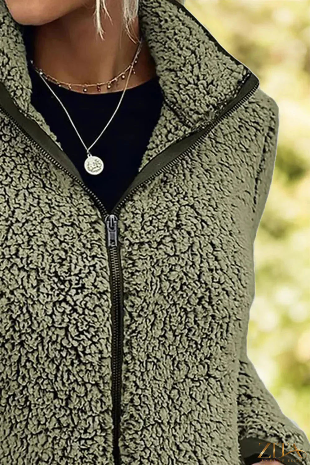 Trendsi pocketed zip-up turtleneck jacket in black, featuring a fitted design and front pockets, casual winter outerwear.