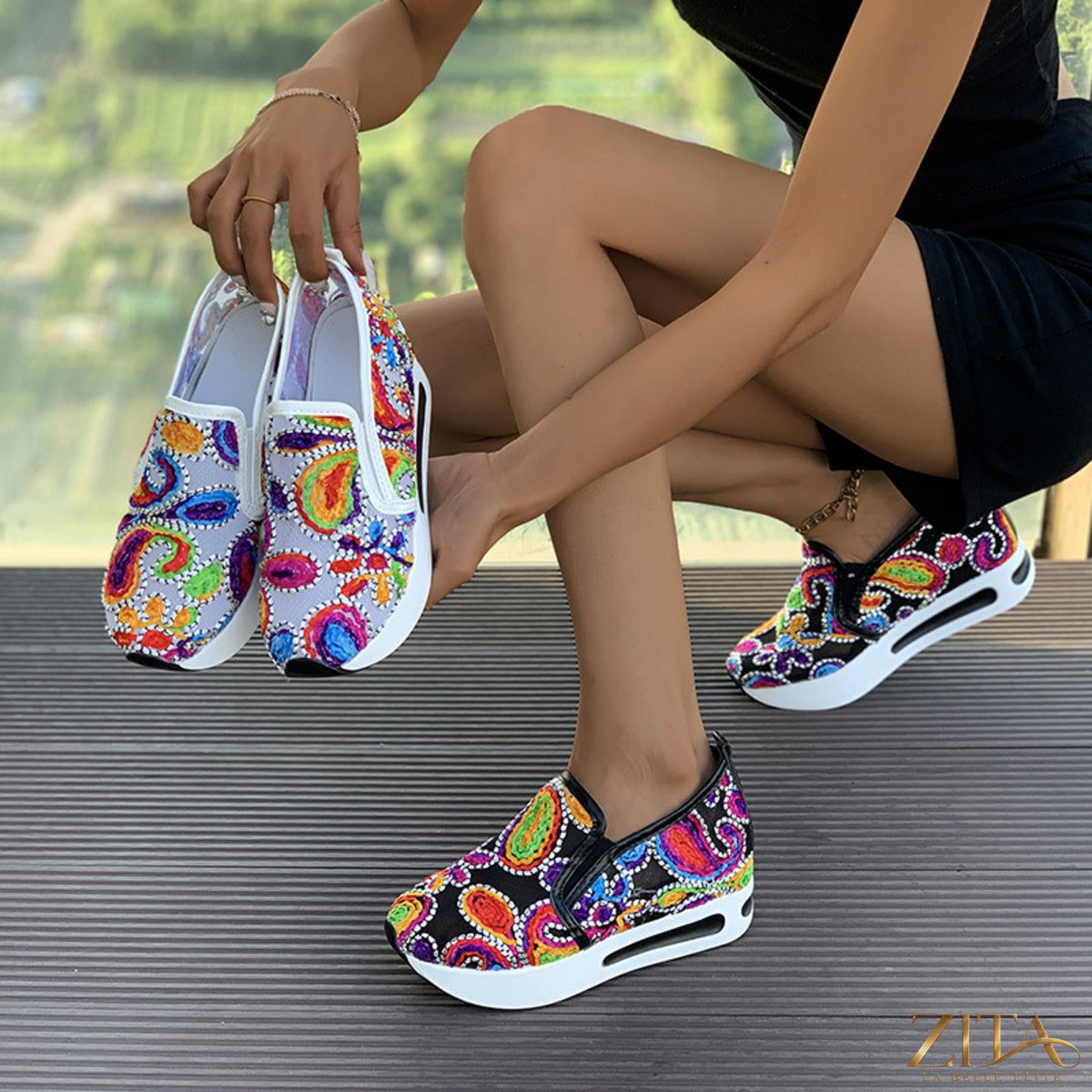 Printed platform round toe sneakers by Zita La Belle Elite featuring bold patterns and white chunky soles.