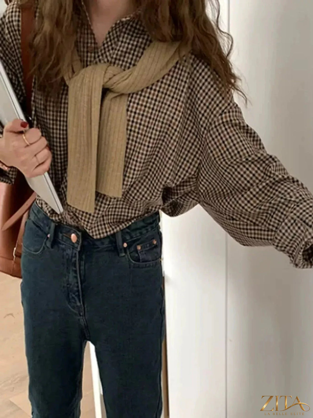 Zita La Belle Elite plaid button-down shirt with a classic checkered pattern, long sleeves, and collar on a model.