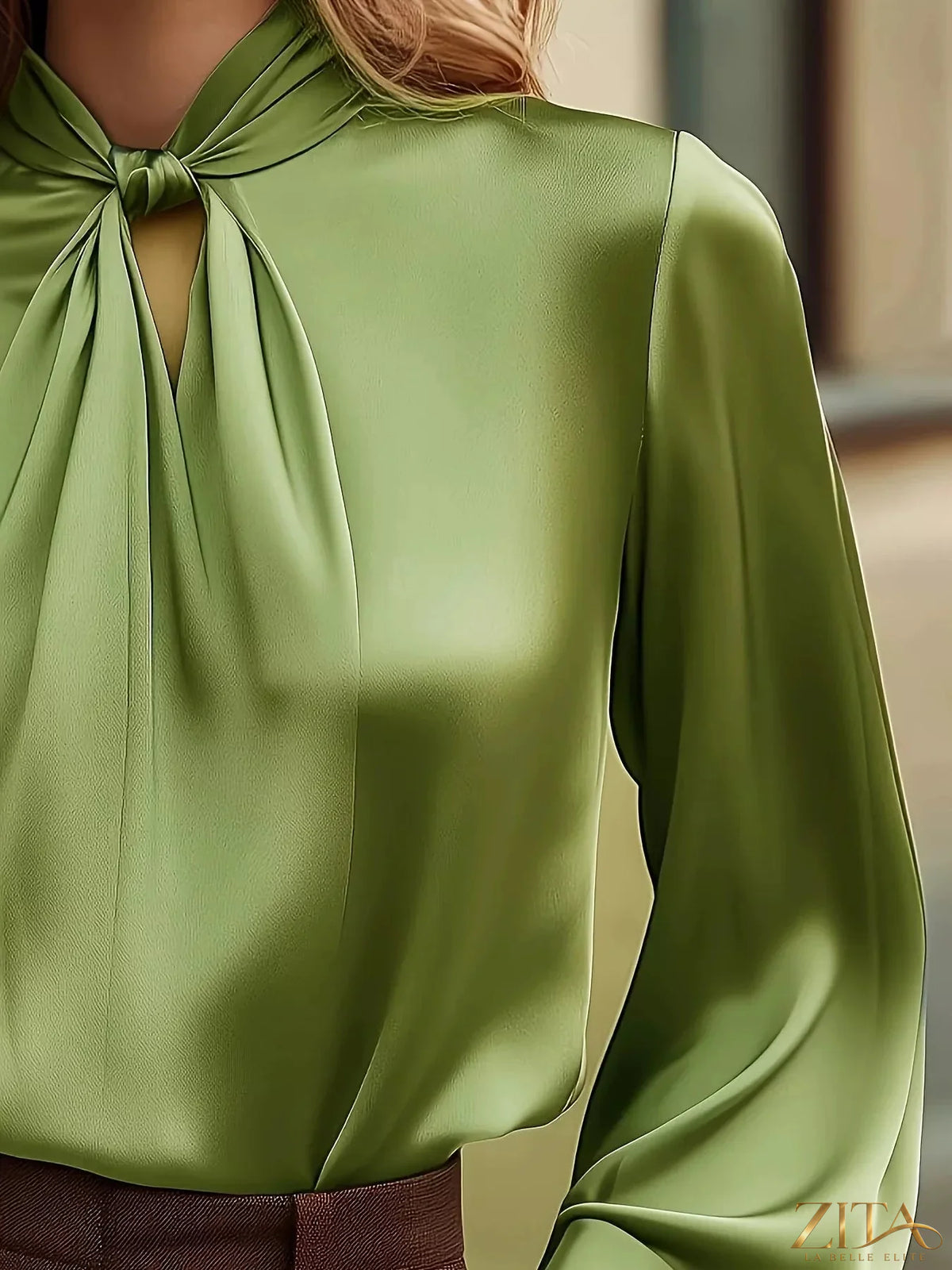 Zita La Belle Elite satin cutout front blouse featuring a sleek design and stylish neckline, perfect for elegant everyday wear.