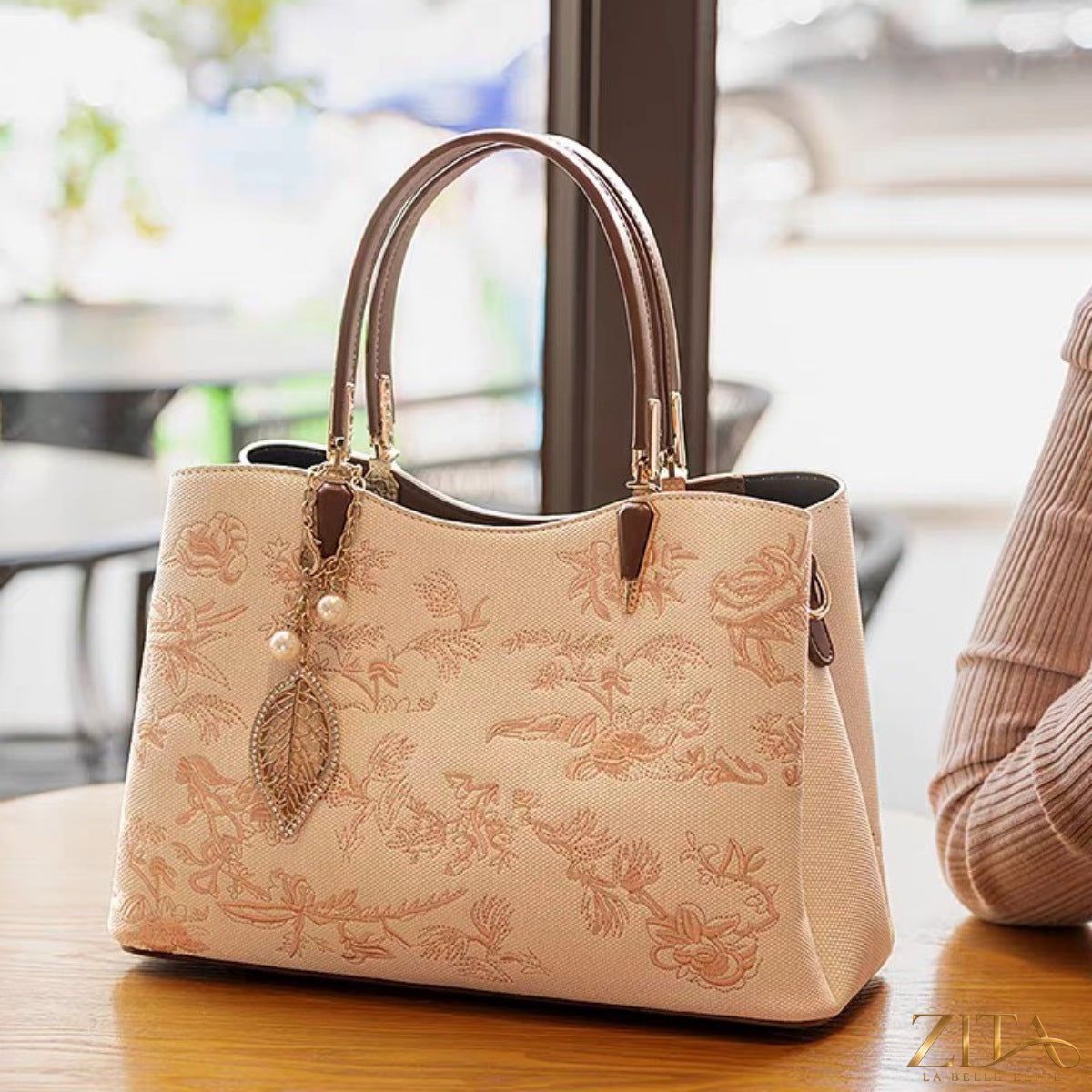 Embroidered floral leather handbag by Zita La Belle Elite with colorful floral embroidery and elegant design.