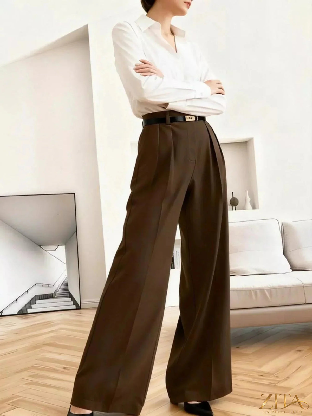 Zita La Belle Elite wide leg pleated pants in a flowing fabric, shown on a model with a high waist and relaxed fit.