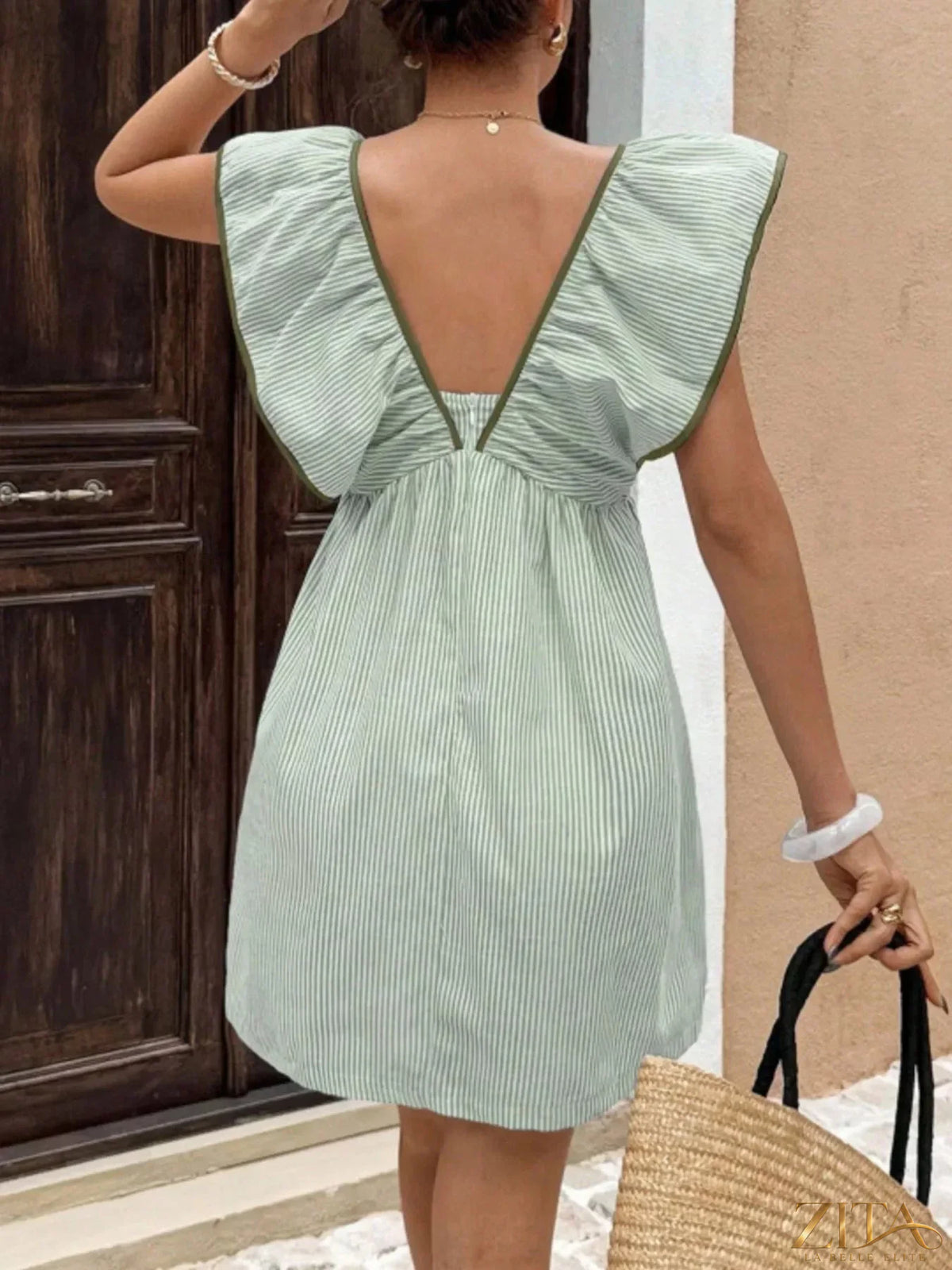 Striped ruffle sleeve mini dress from Trendsi featuring a fitted silhouette and playful ruffle accents on the sleeves.