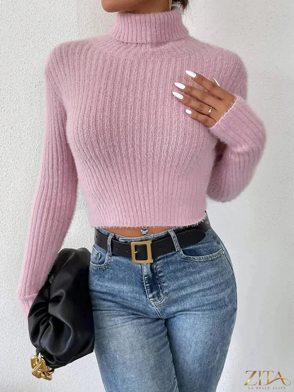 Ribbed turtleneck long sleeve sweater by Trendsi, featuring a fitted design and cozy knit fabric in a neutral color.