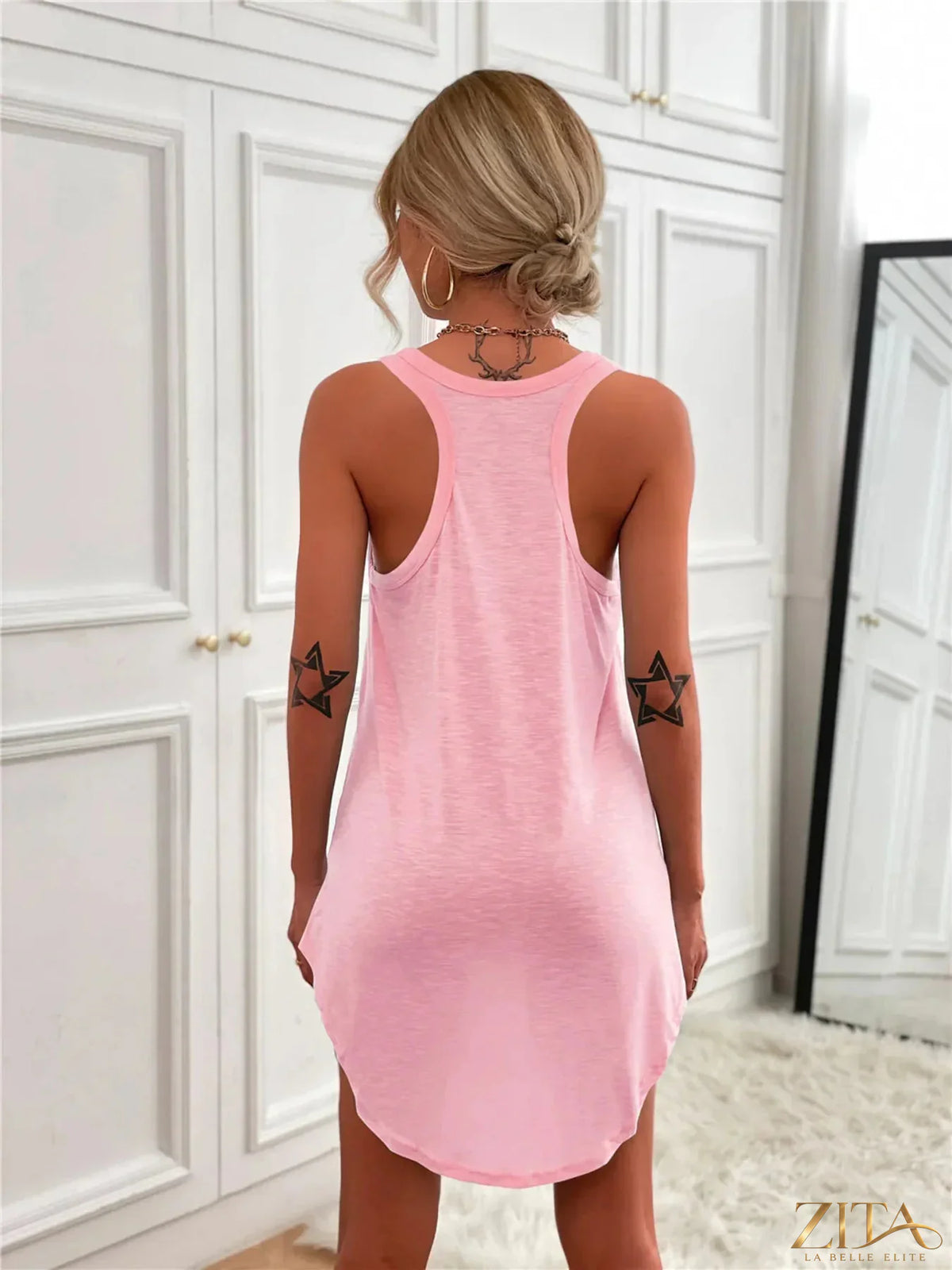 Zita La Belle Elite casual tank mini dress with curved hem, sleeveless design, and lightweight fabric suitable for warm weather.