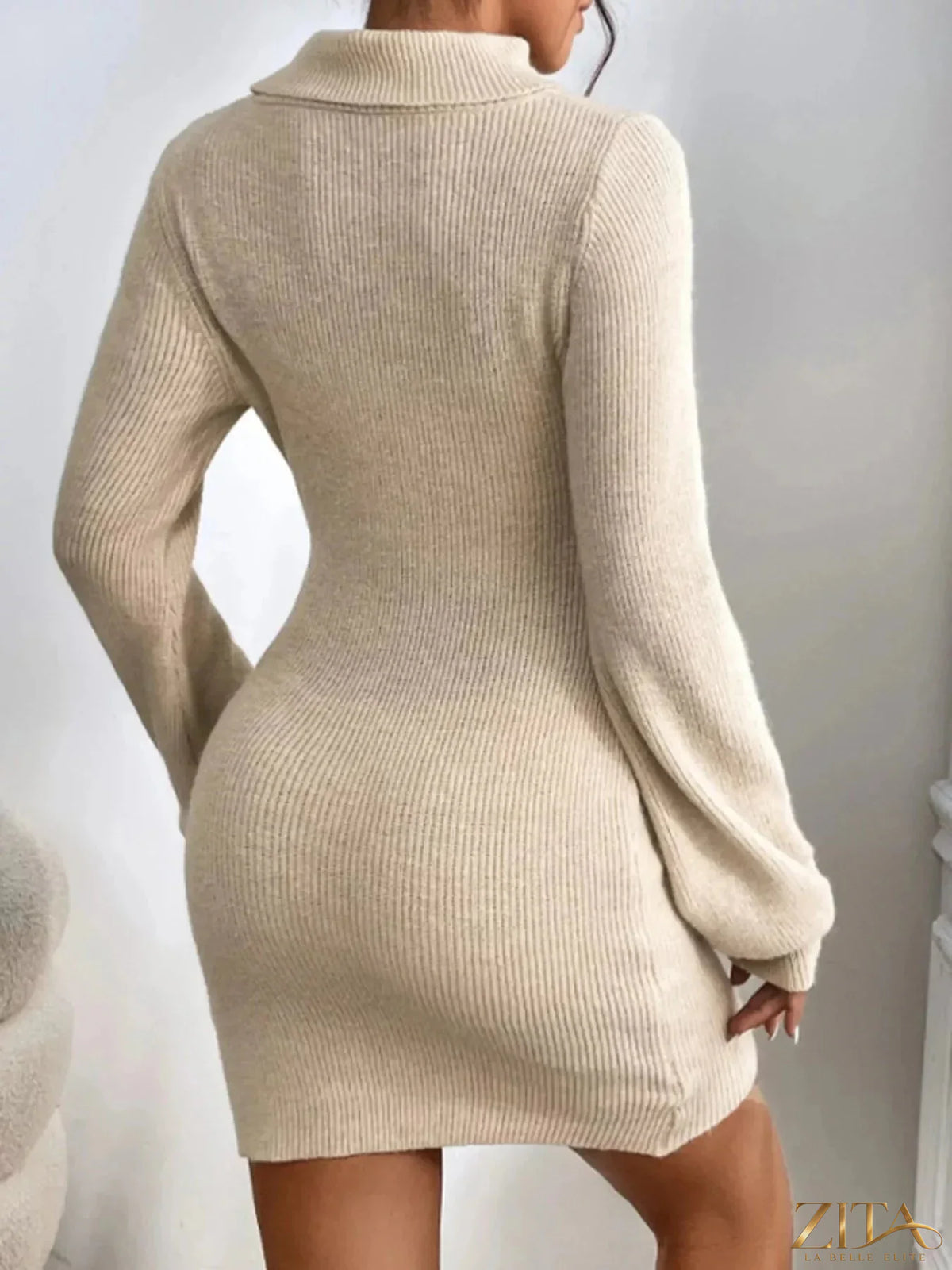Ribbed knit turtleneck sweater dress in a fitted style, featuring long sleeves and a classic design from Trendsi.