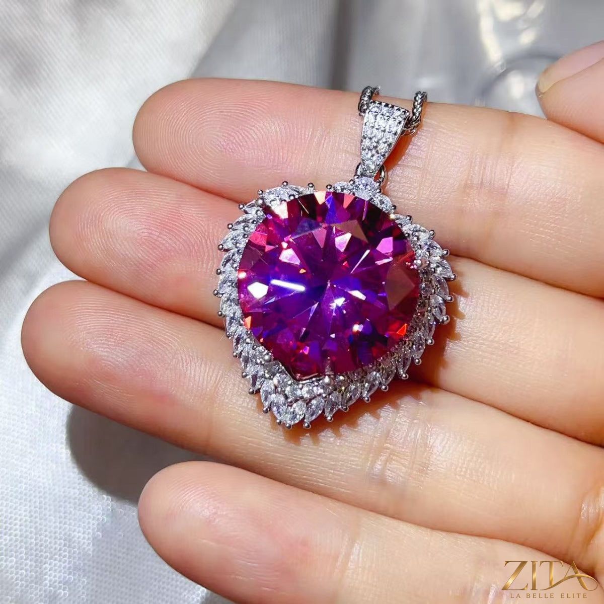 Sterling silver pendant necklace with a 20-carat moissanite gemstone, showcasing a sparkling, elegant jewelry design.