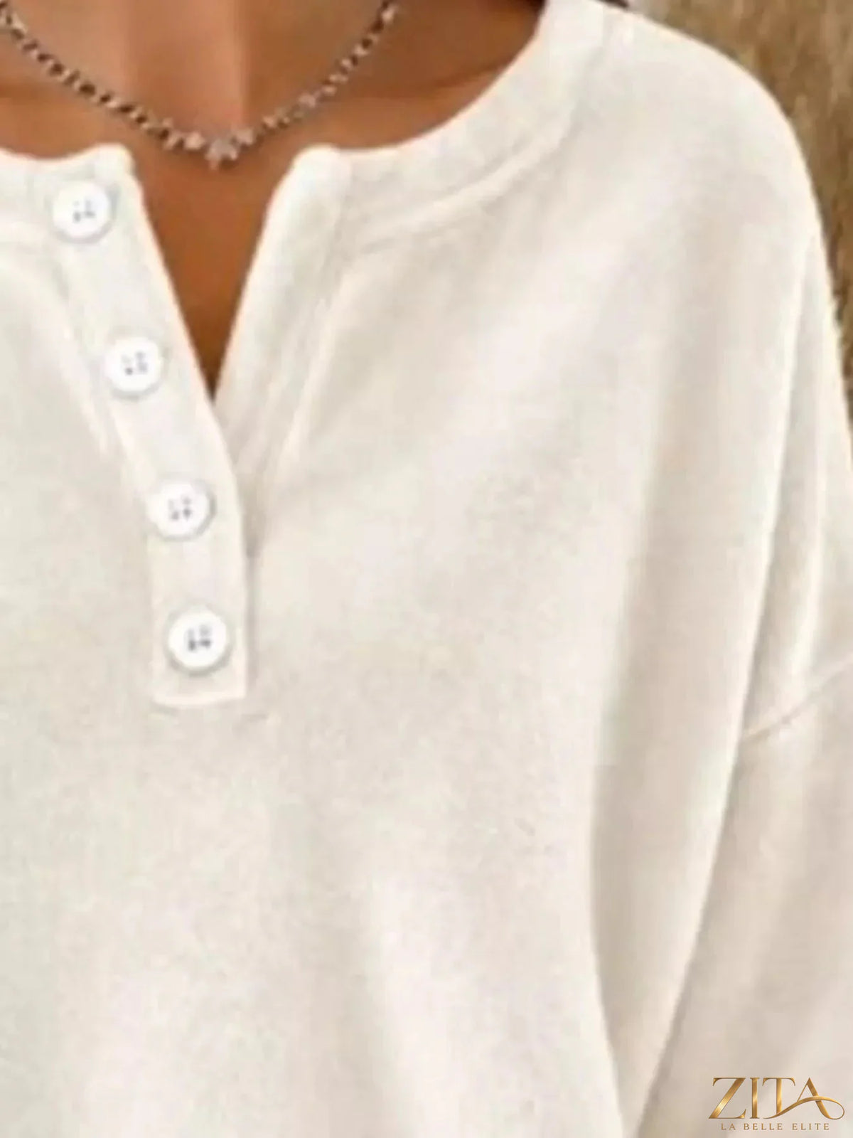 Zita La Belle Elite button detail dropped shoulder sweatshirt in soft fabric, with visible buttons on the shoulder.
