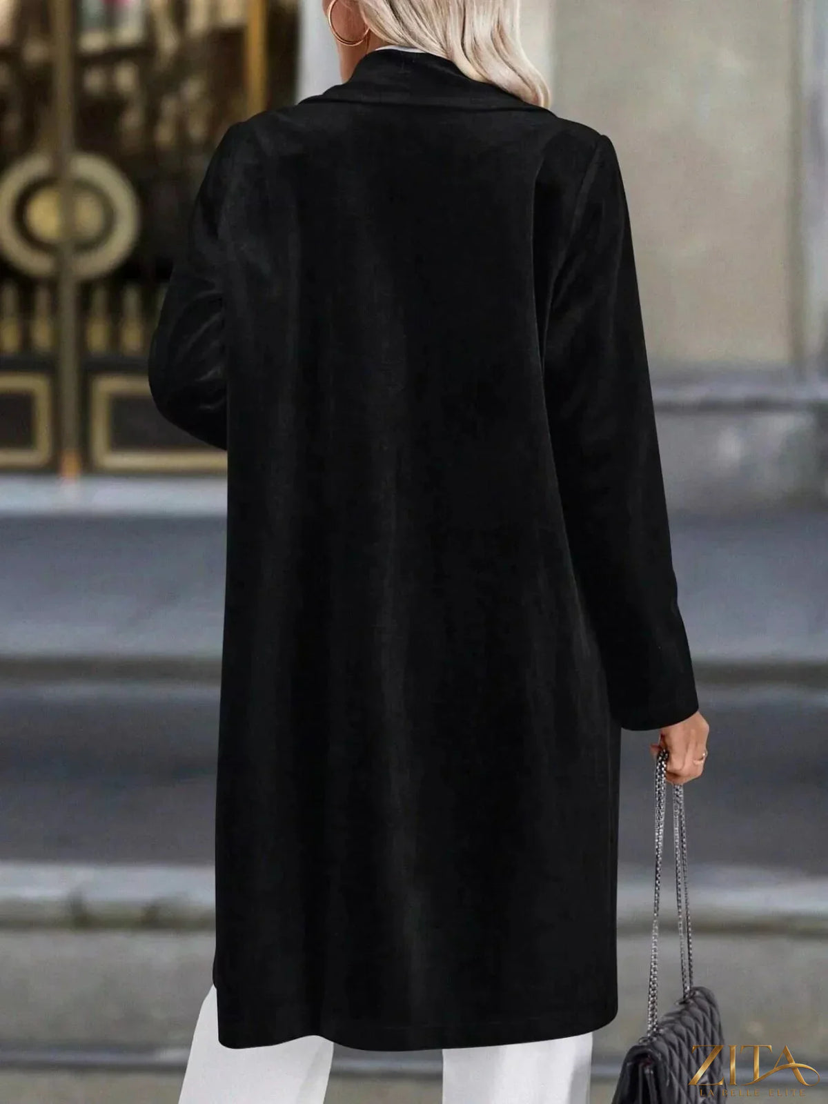 Zita La Belle Elite longline coat with lapel collar, long sleeves, and a tailored fit, shown in a stylish outerwear design.