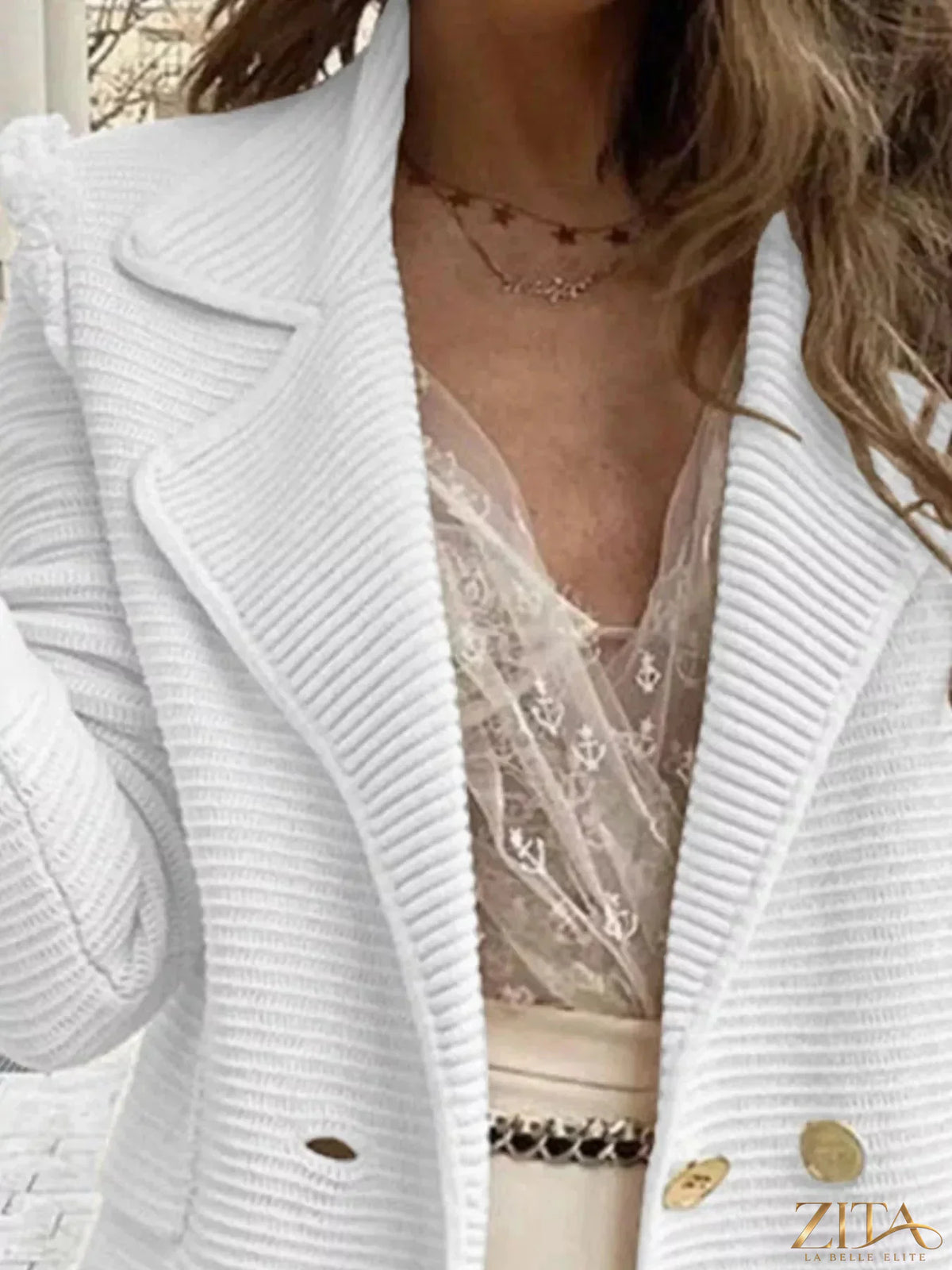 Zita La Belle Elite texture knit double-breasted blazer in neutral tones, shown on a mannequin with lapels and button details