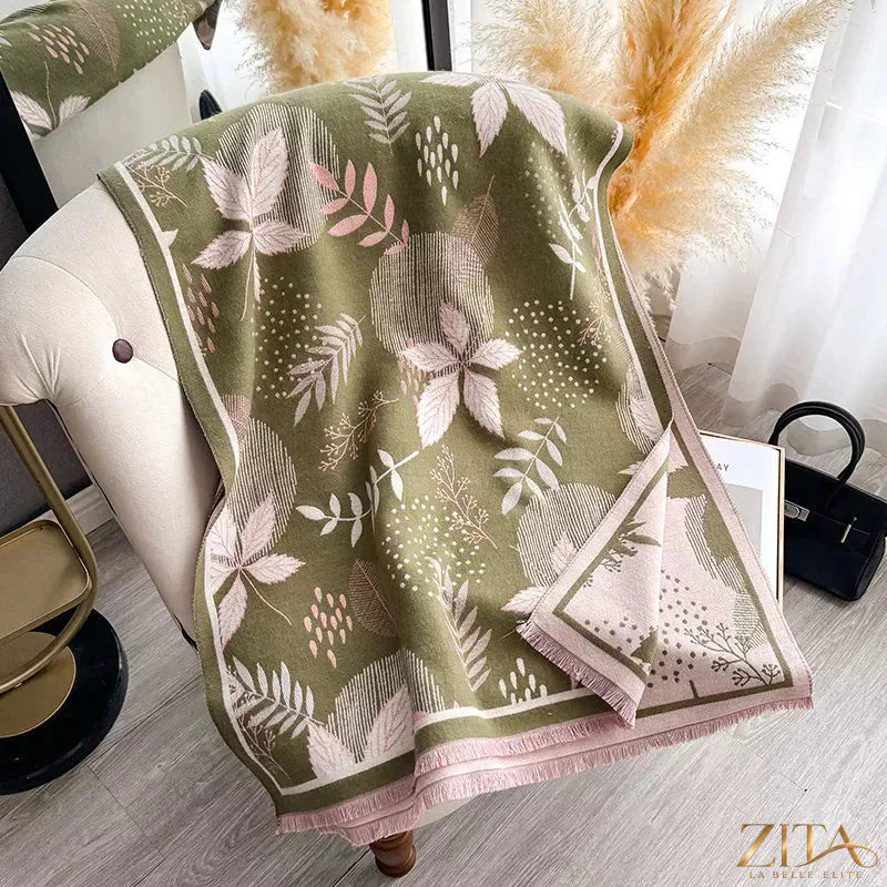 Printed raw hem scarf by Zita La Belle Elite featuring floral patterns and fringed edges, styled draped over a neutral background.
