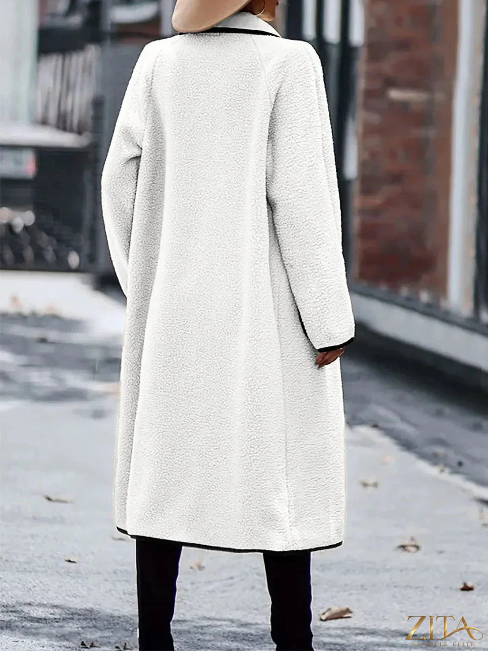 Zita La Belle Elite long sleeve coat with contrast trim and pockets, stylish full-size outerwear in black and white.